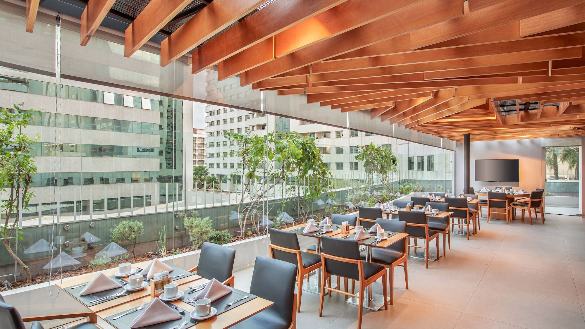 a restaurant with tables and chairs