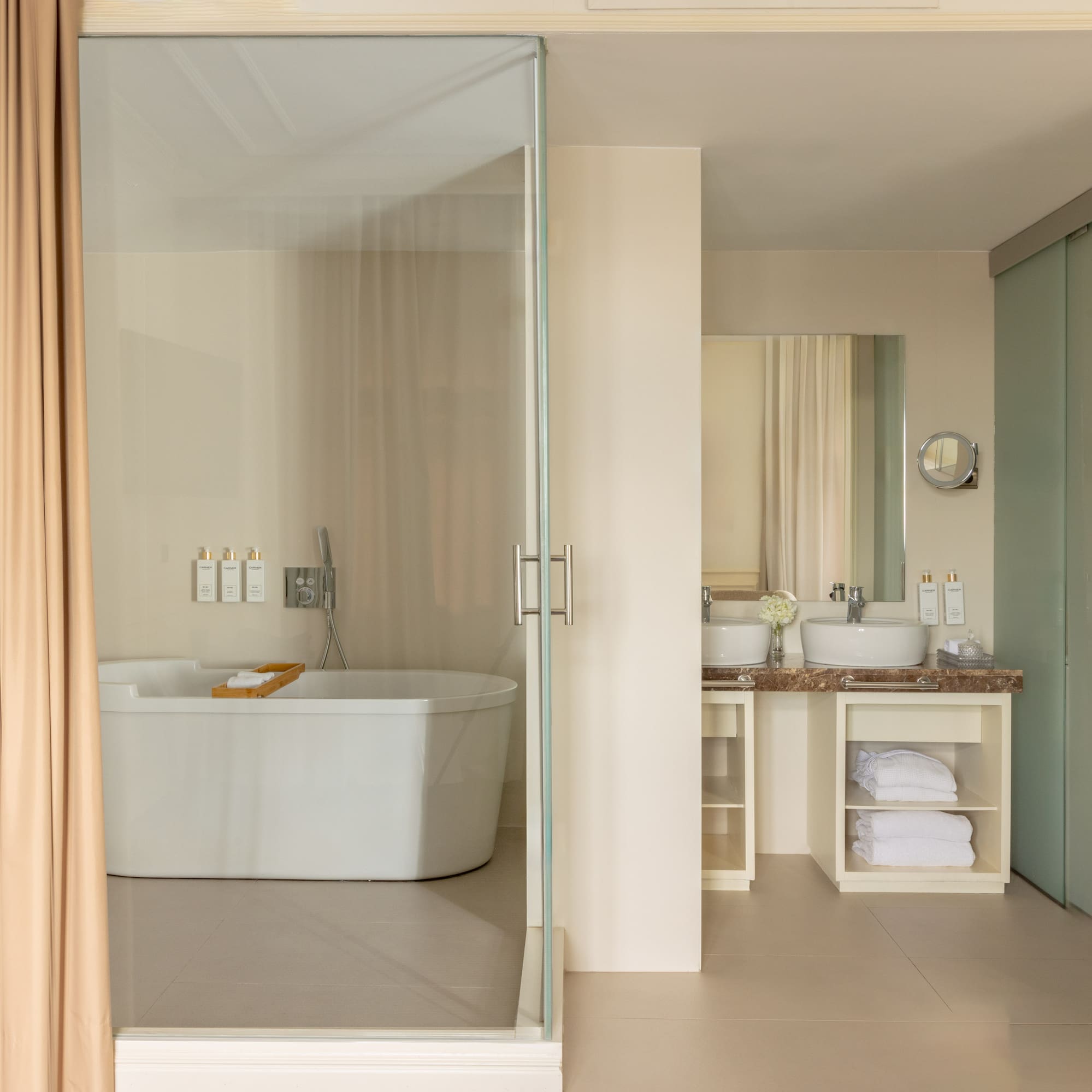 a bathroom with a glass door