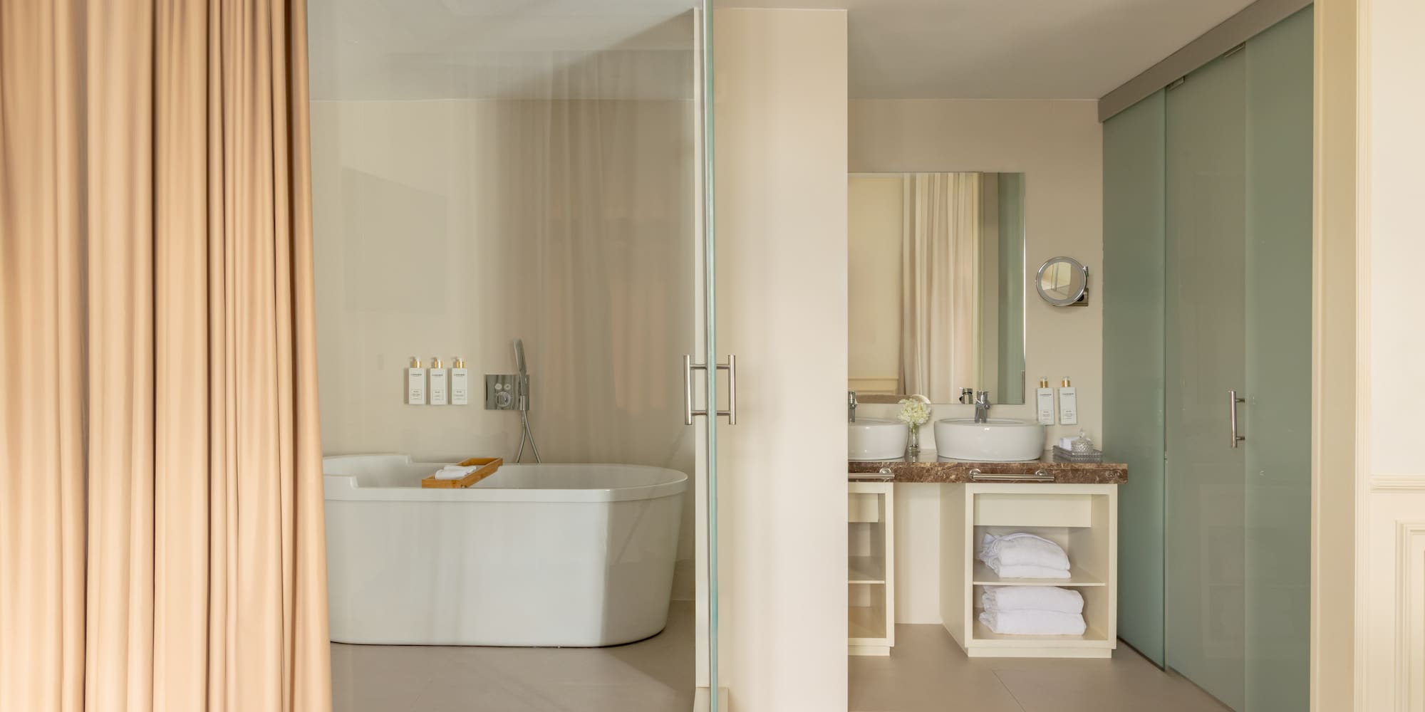 a bathroom with a glass door