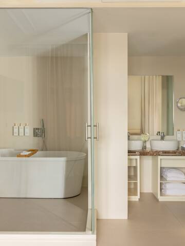 a bathroom with a glass door