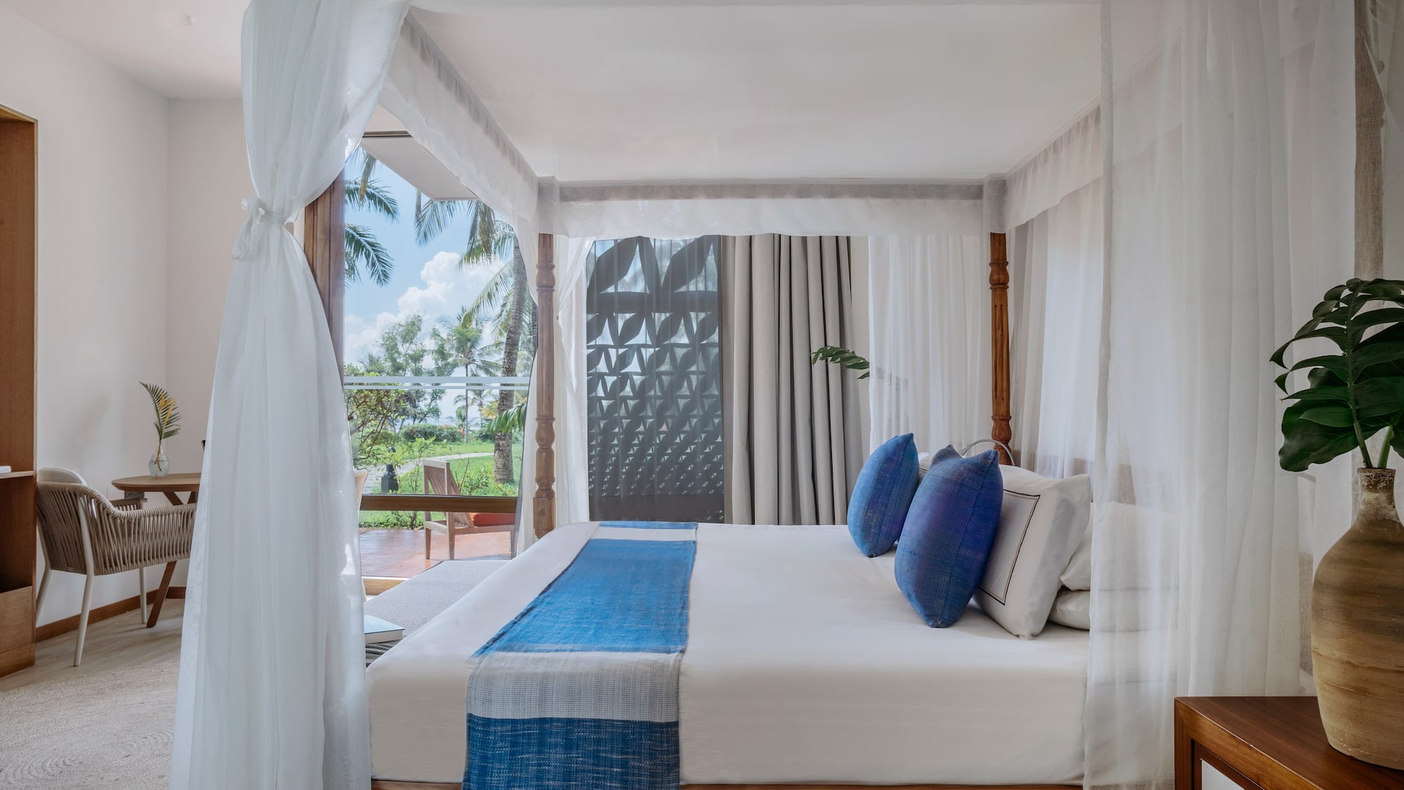 Renovated Premium room with a canopy bed at Melia Zanzibar with garden views