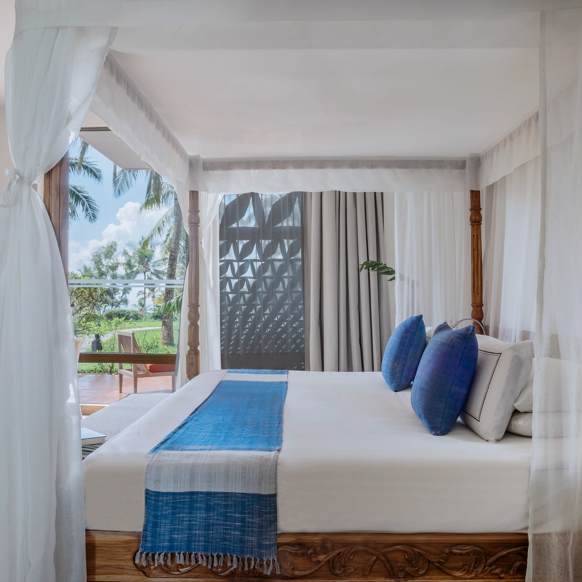 Renovated Premium room with a canopy bed at Melia Zanzibar with garden views
