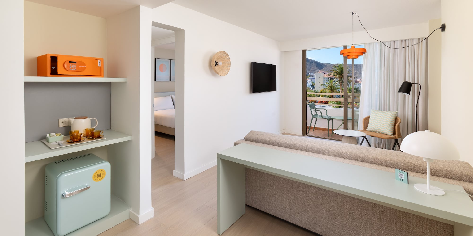 a room with a couch and a television