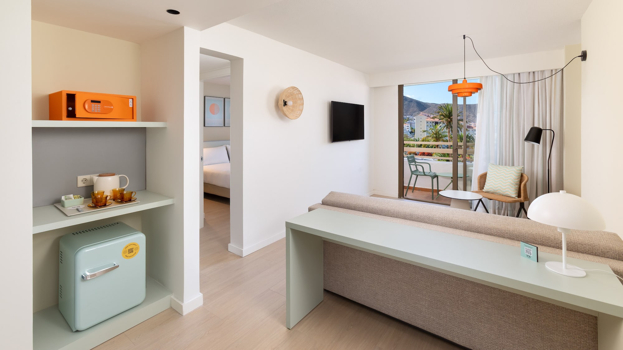 a room with a couch and a television