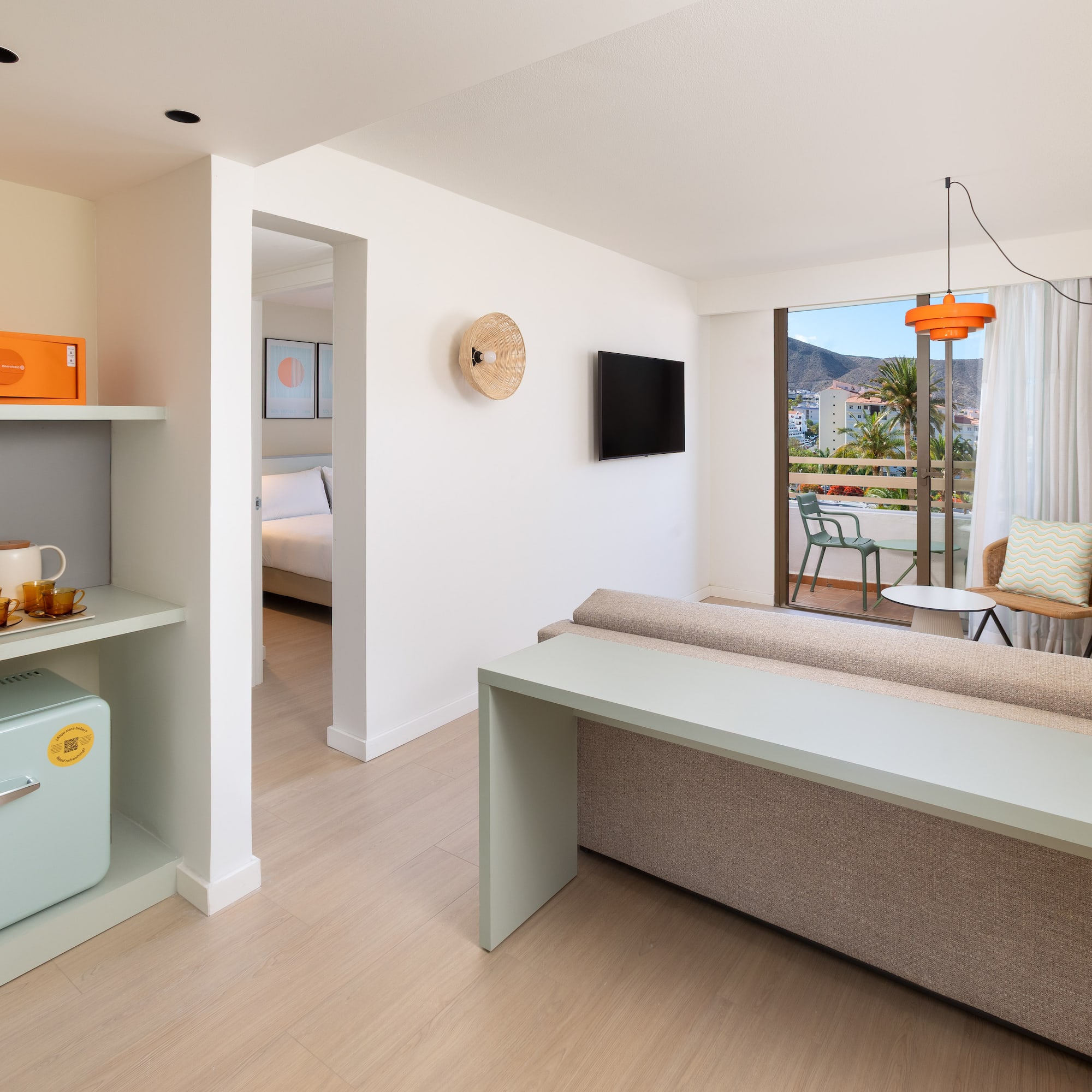 a room with a couch and a television