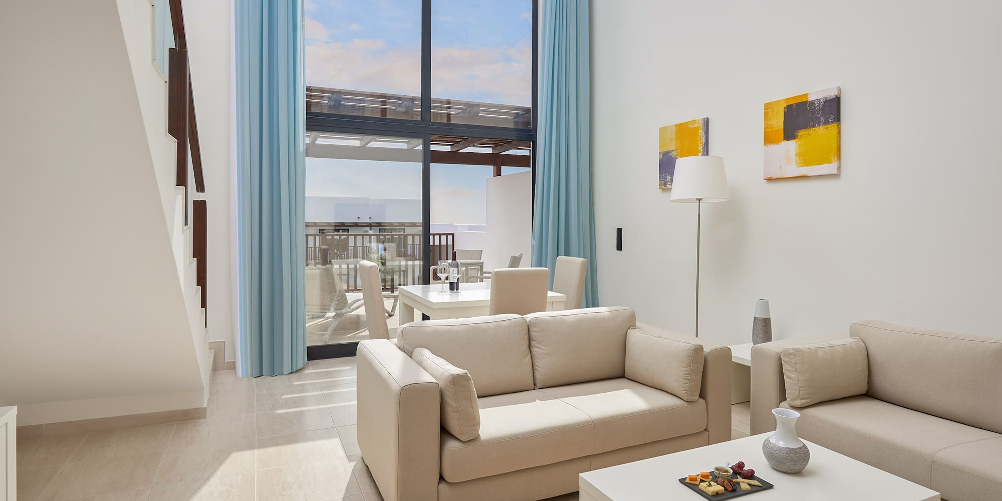 a living room with a couch and a table