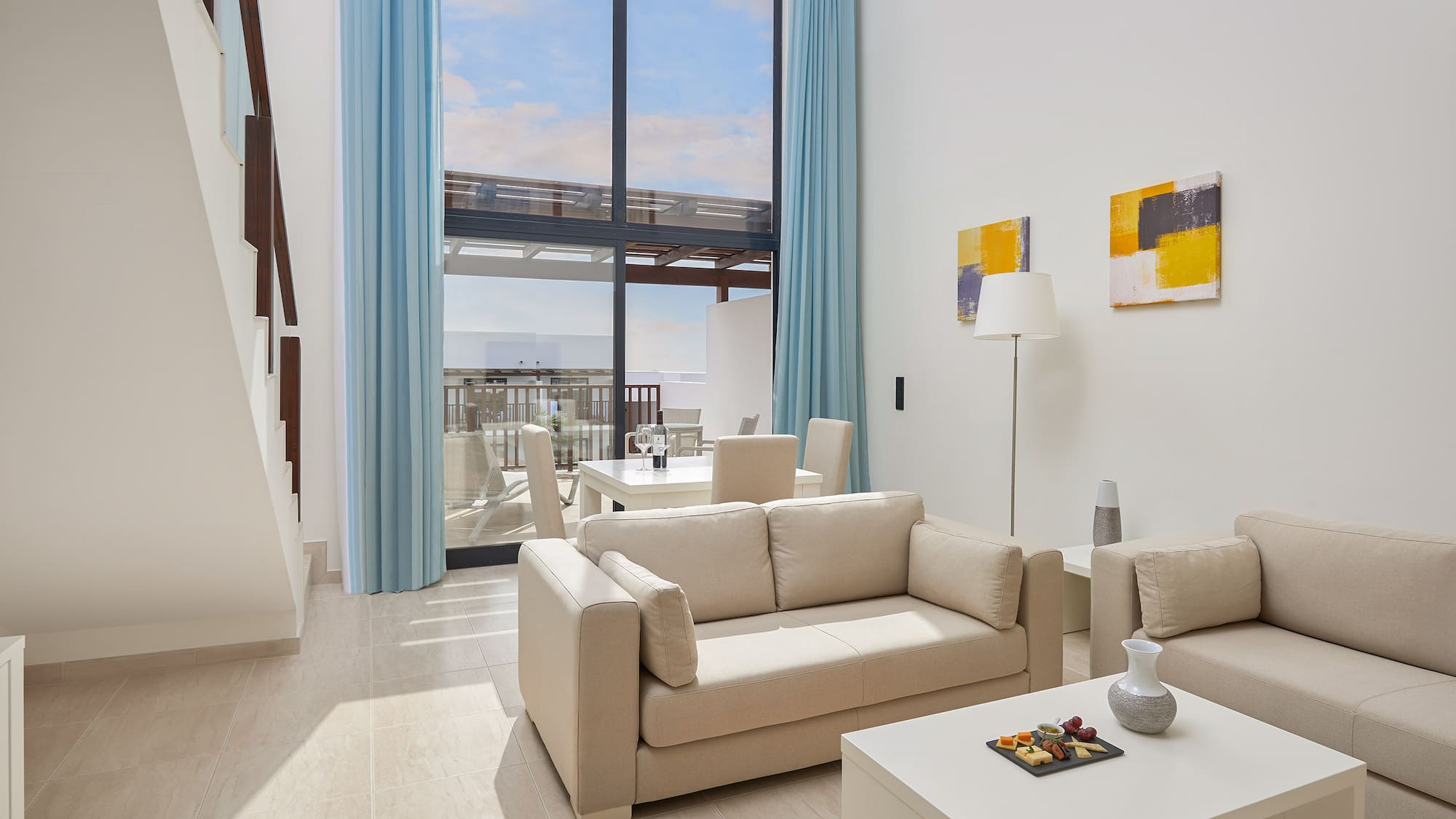 a living room with a couch and a table