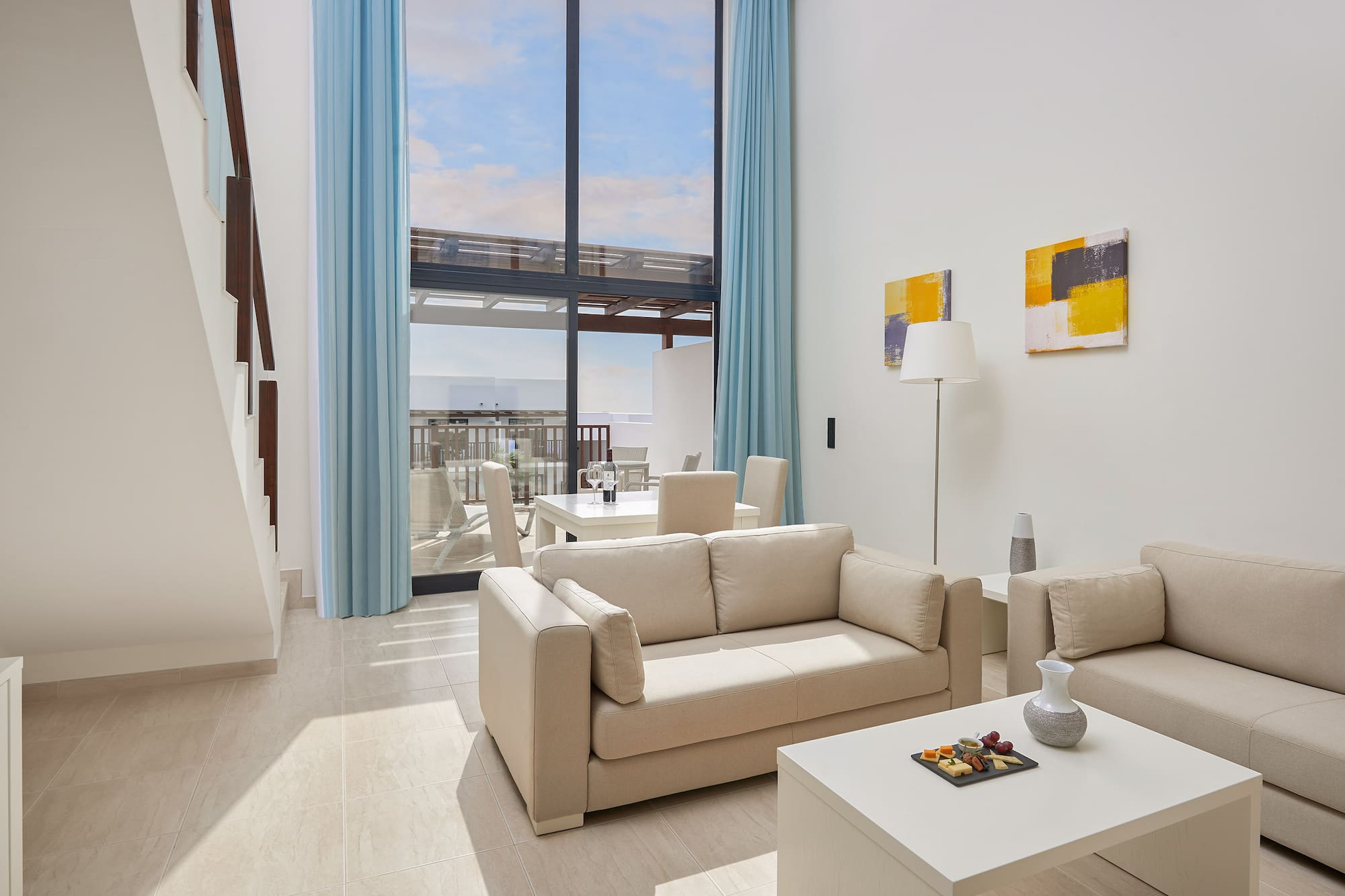 a living room with a couch and a table