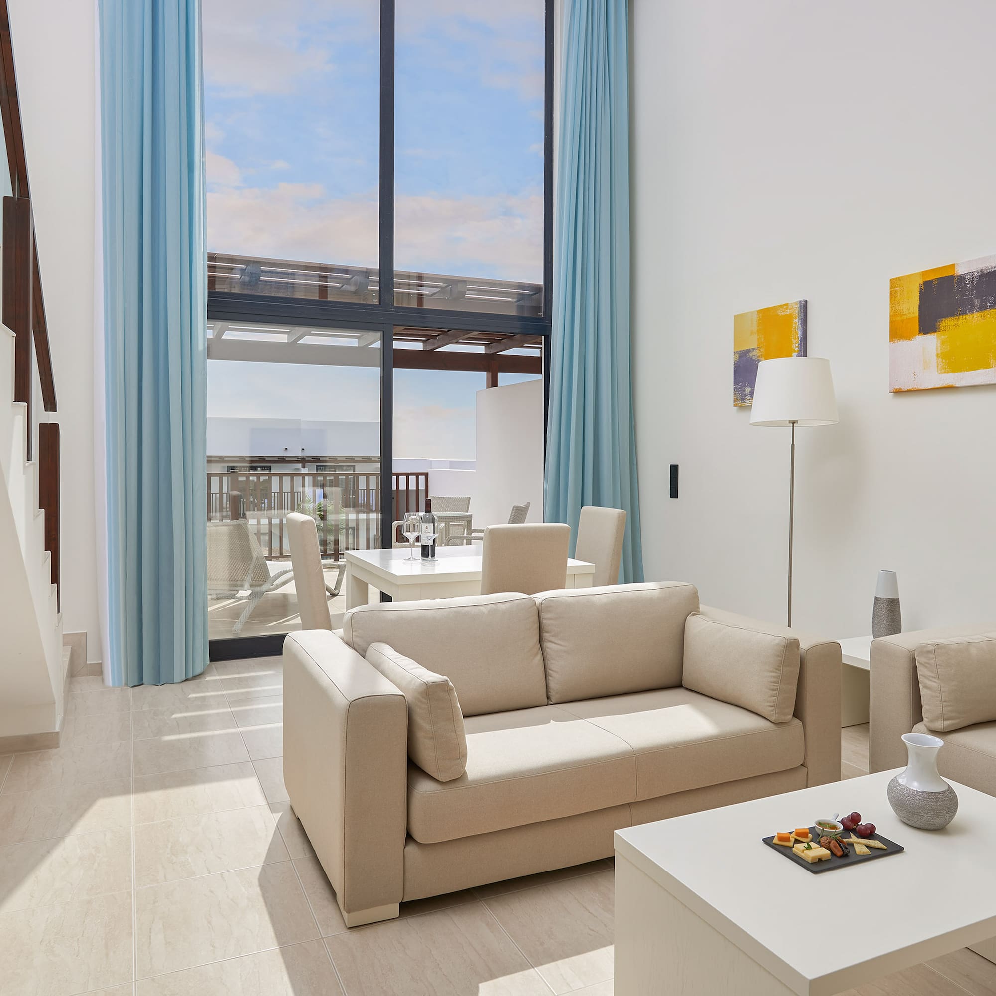 a living room with a couch and a table