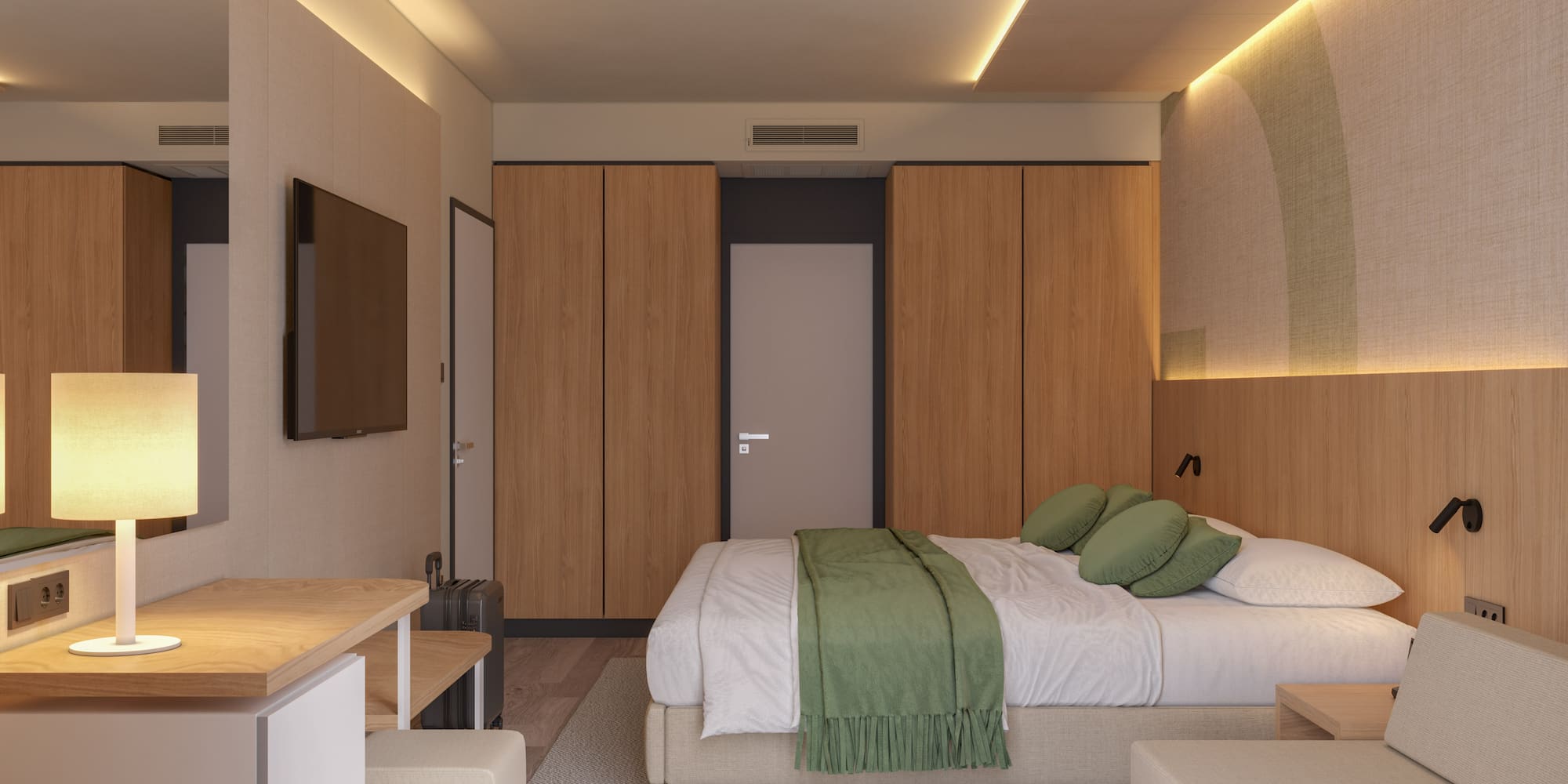 a bedroom with a bed and a tv