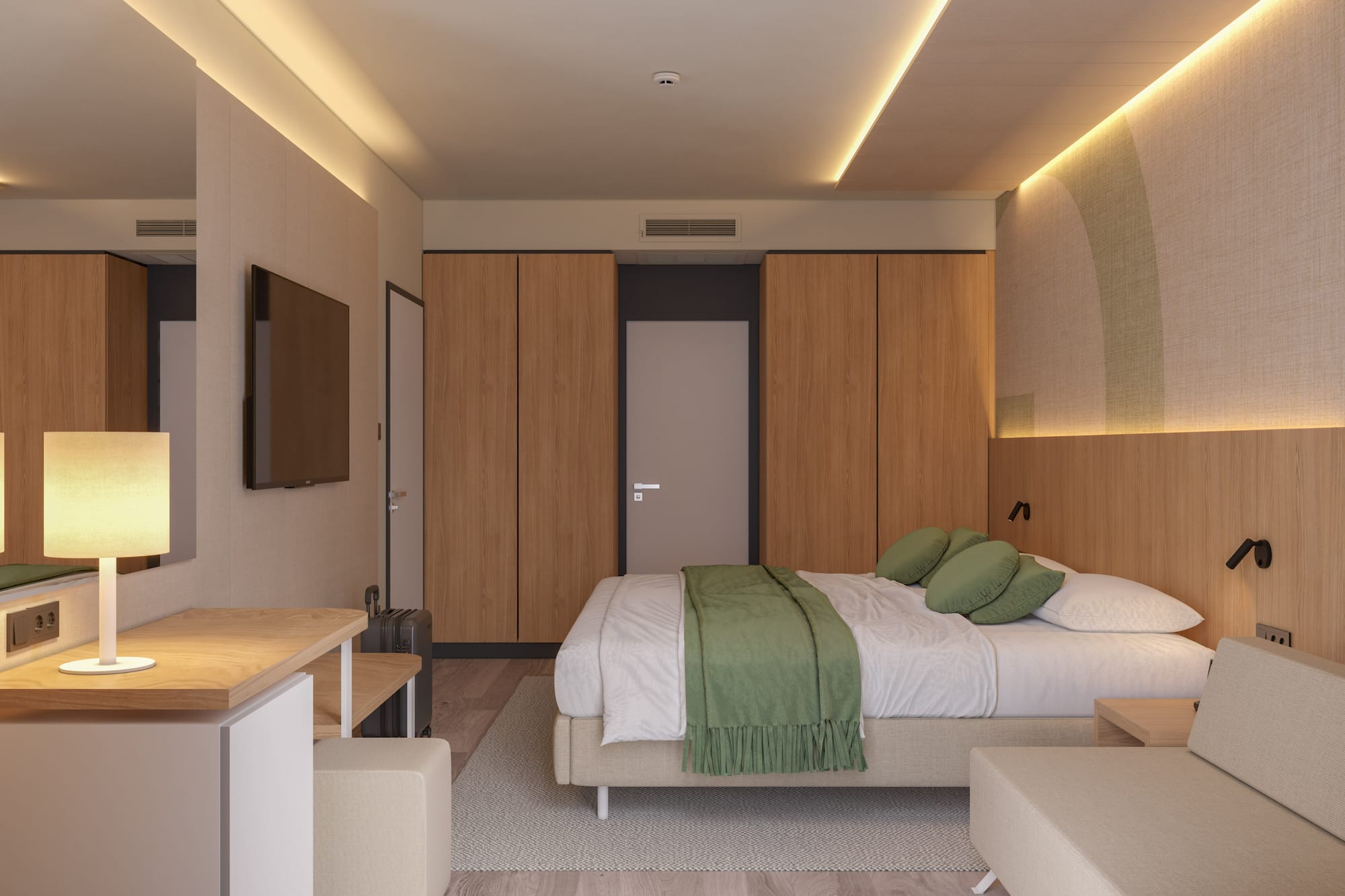 a bedroom with a bed and a tv