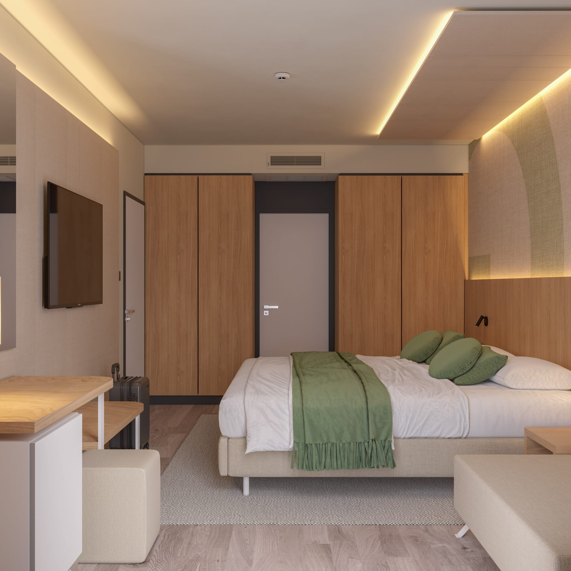 a bedroom with a bed and a tv