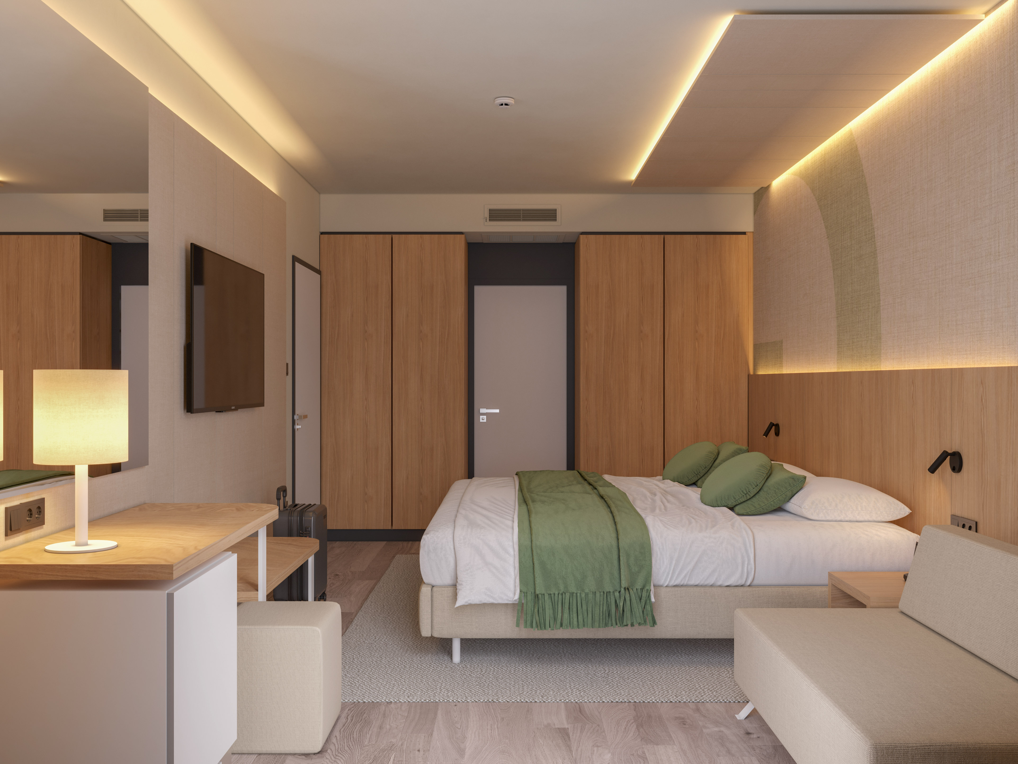 a bedroom with a bed and a tv