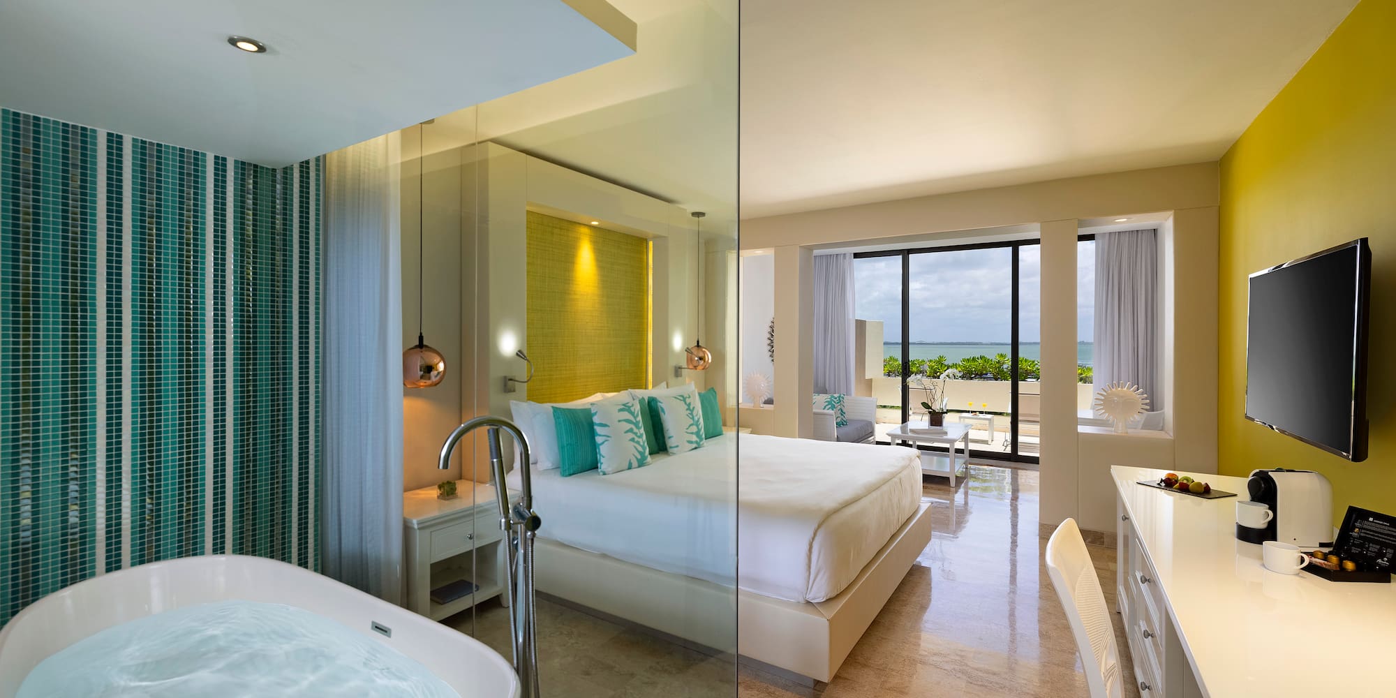 a room with a bathtub and a bed