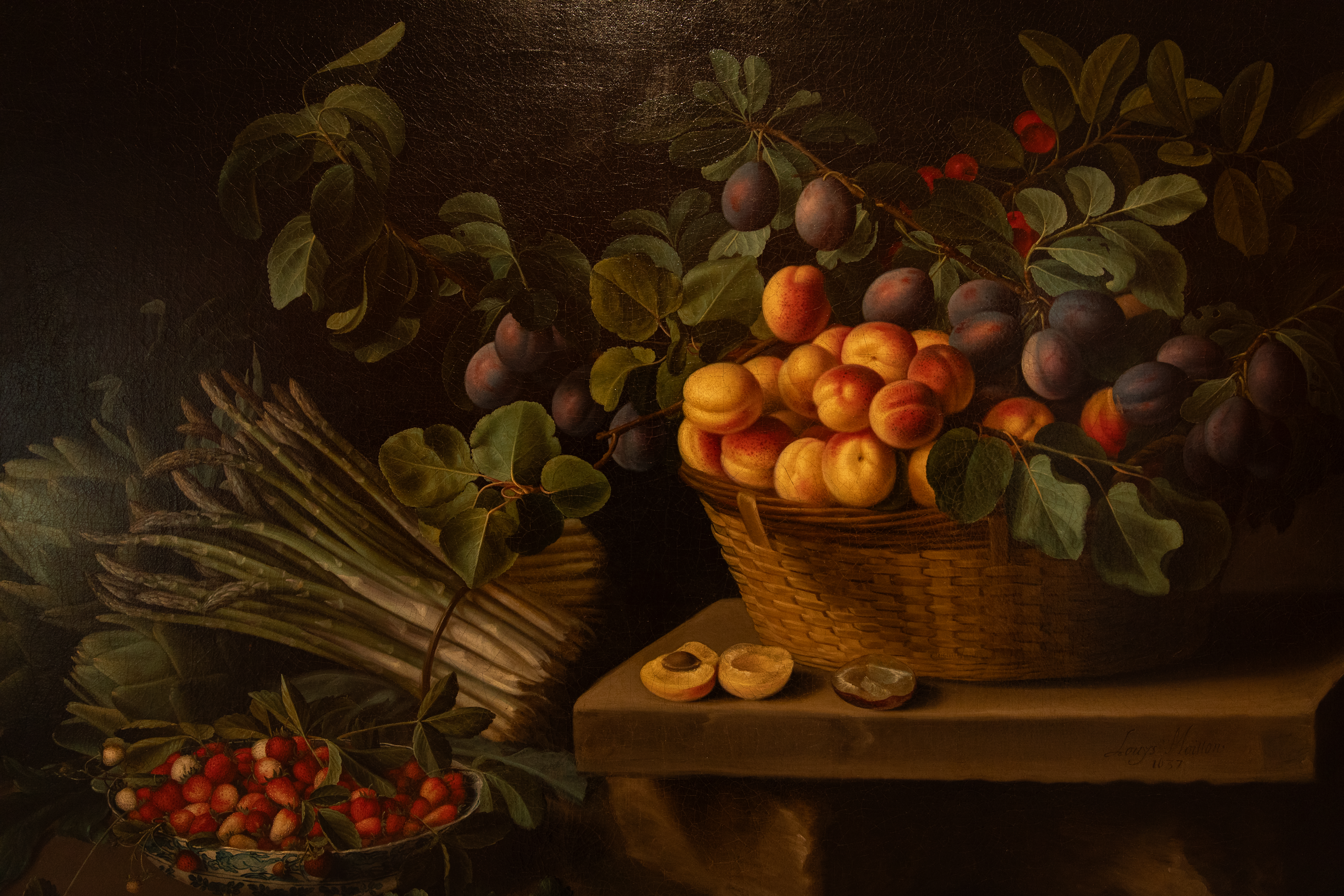 a painting of fruit in a basket