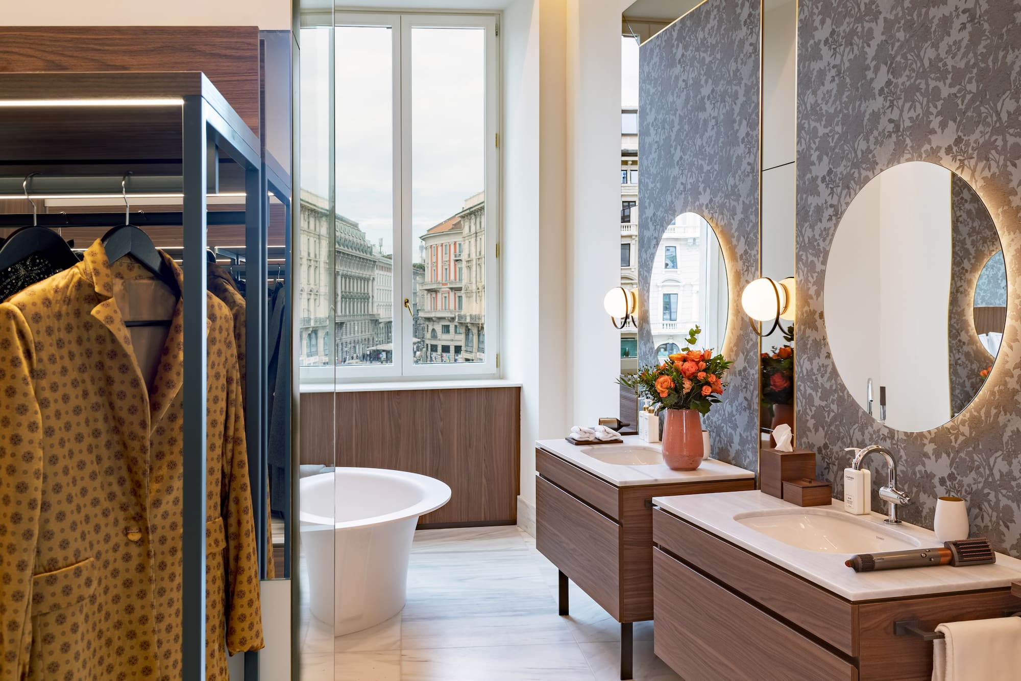 a bathroom with a tub and sink