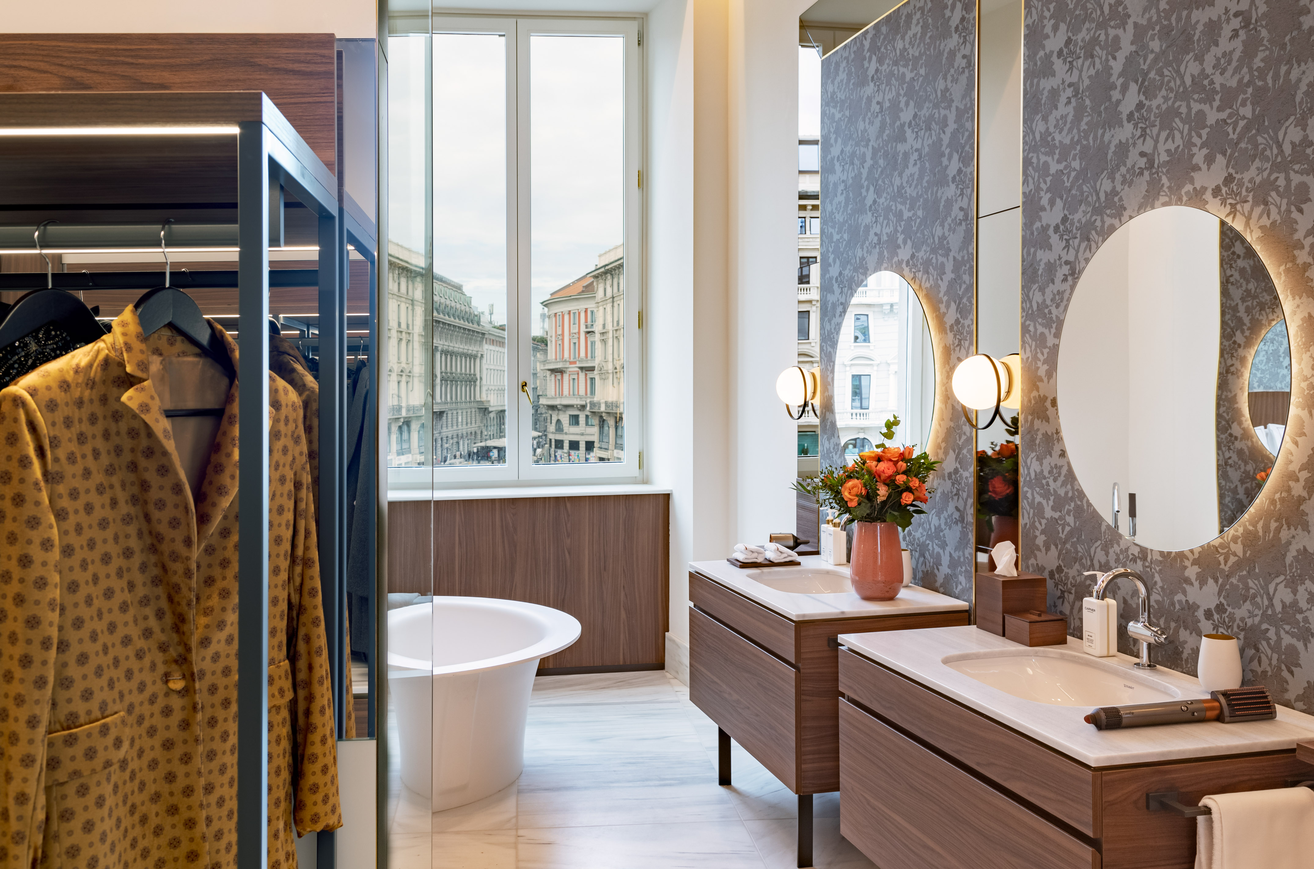 a bathroom with a tub and sink
