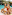 Friends in swimsuits relax poolside on lounge chairs with fresh fruit.