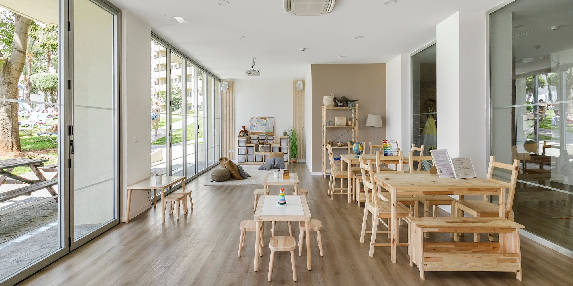 a room with tables and chairs