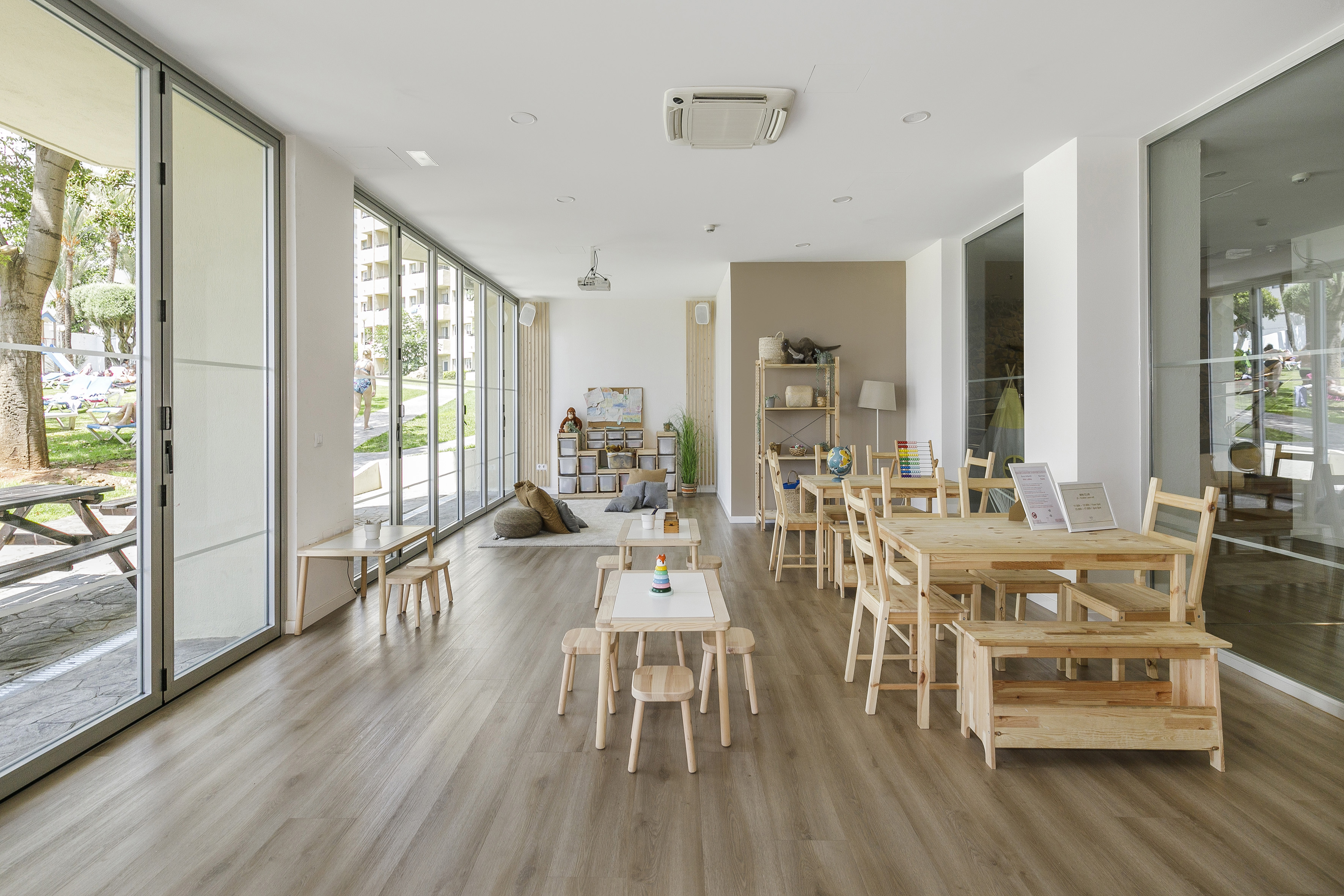 a room with tables and chairs