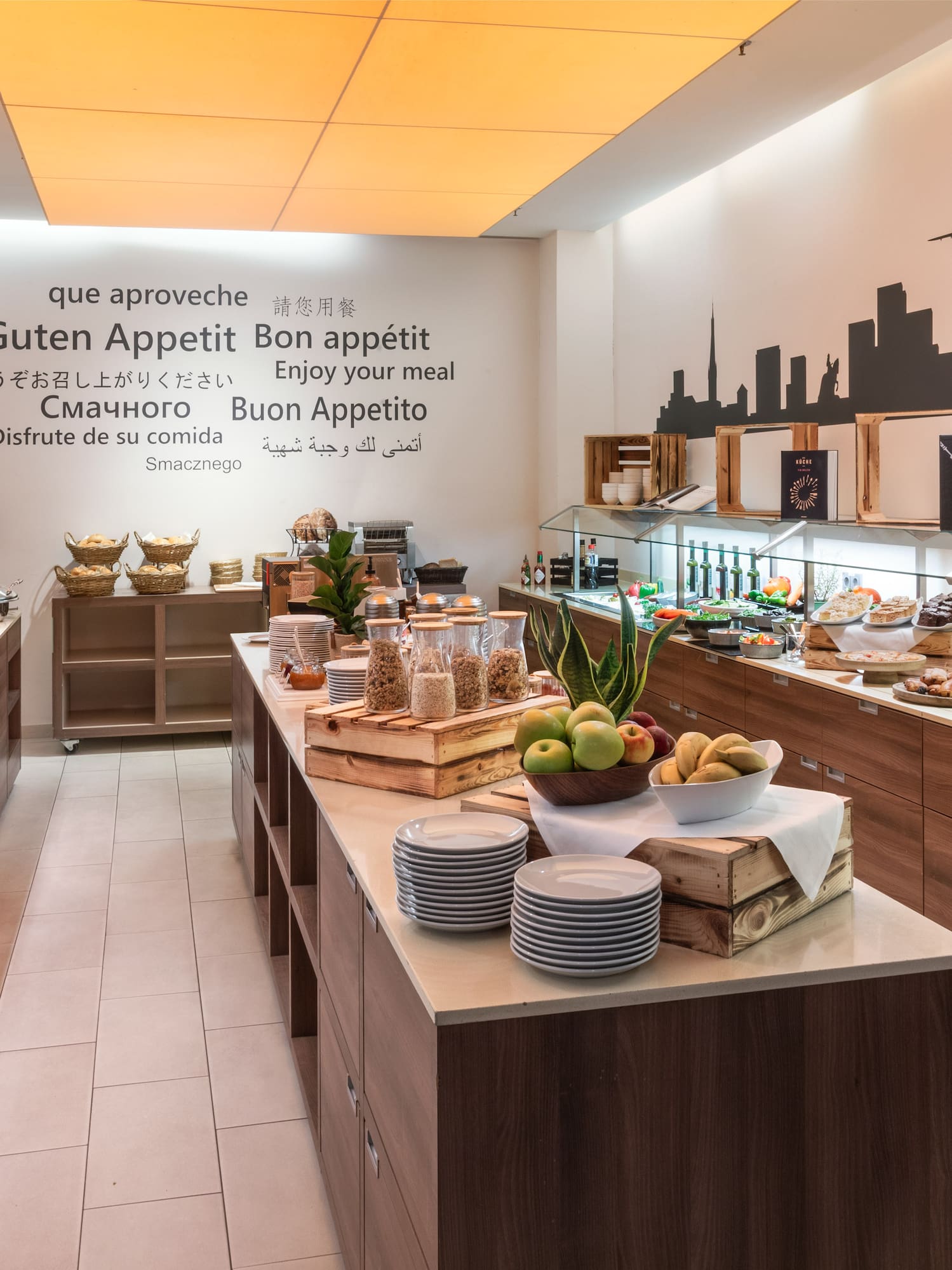 a buffet room with food on the counter