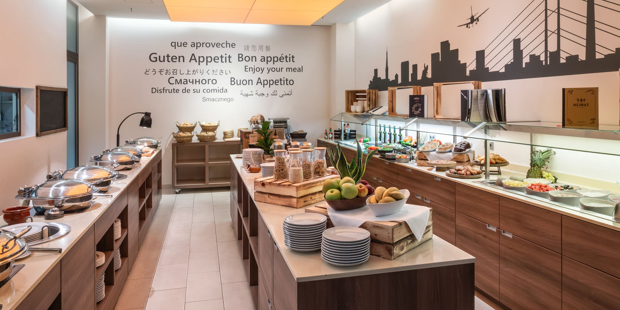 a buffet room with food on the counter