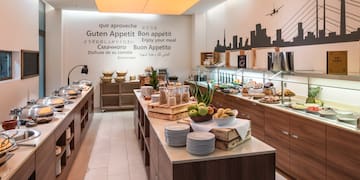 a buffet room with food on the counter