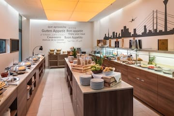 a buffet room with food on the counter