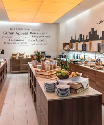 a buffet room with food on the counter