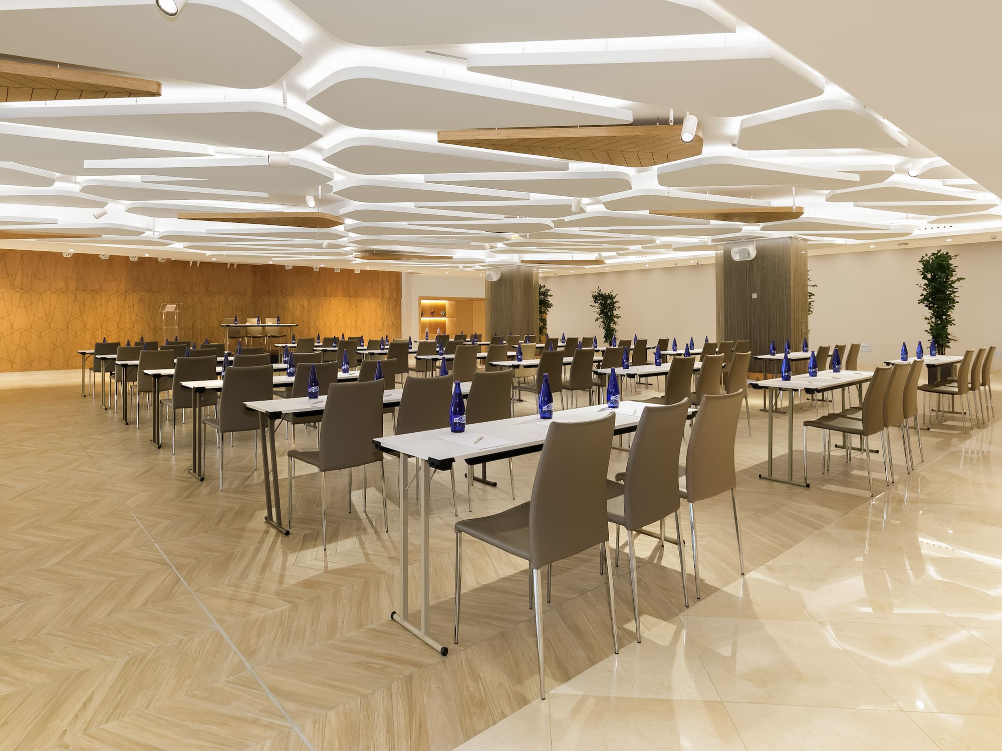 a room with tables and chairs.