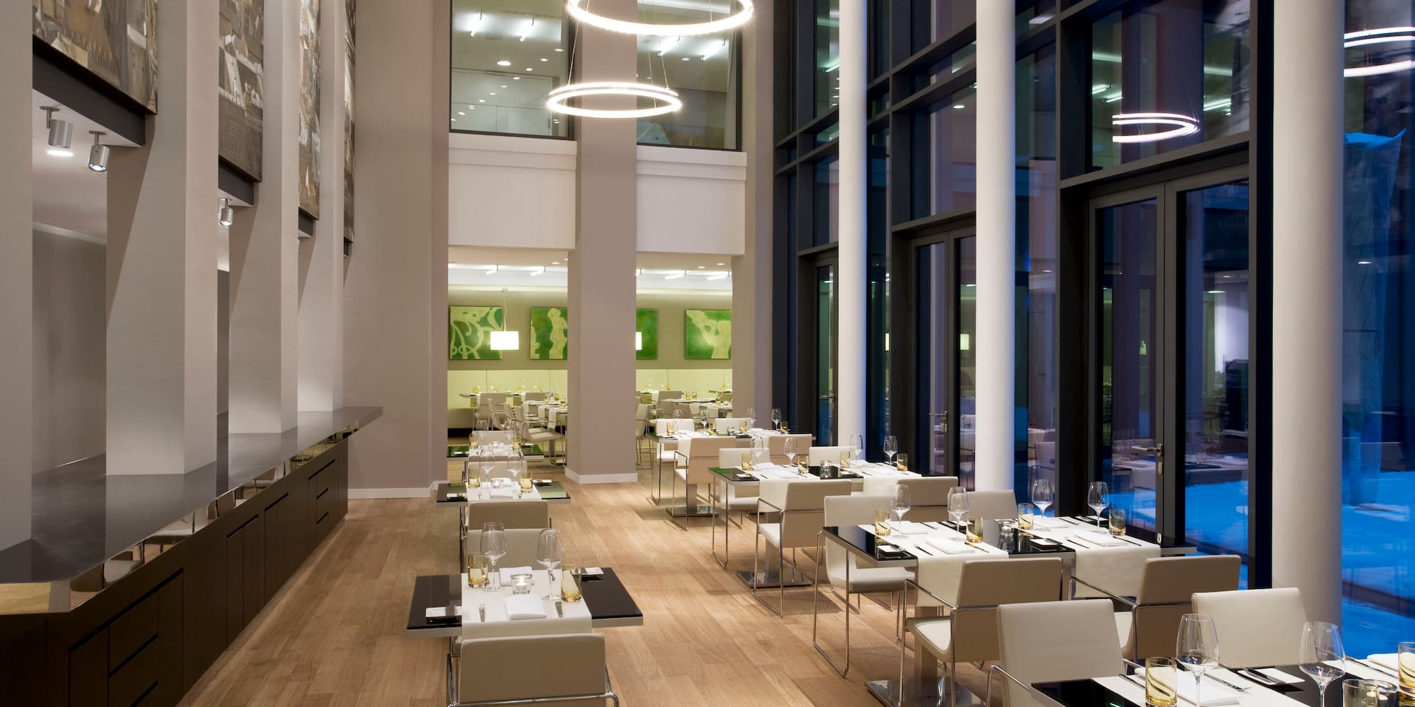 a restaurant with tables and chairs