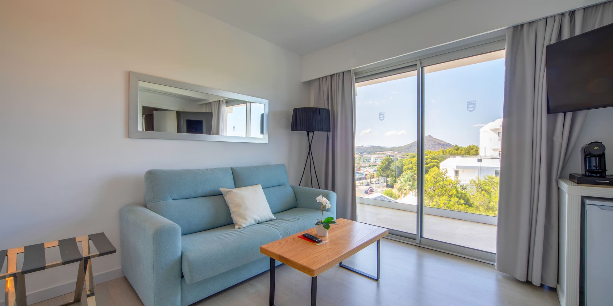 a living room with a couch and a table