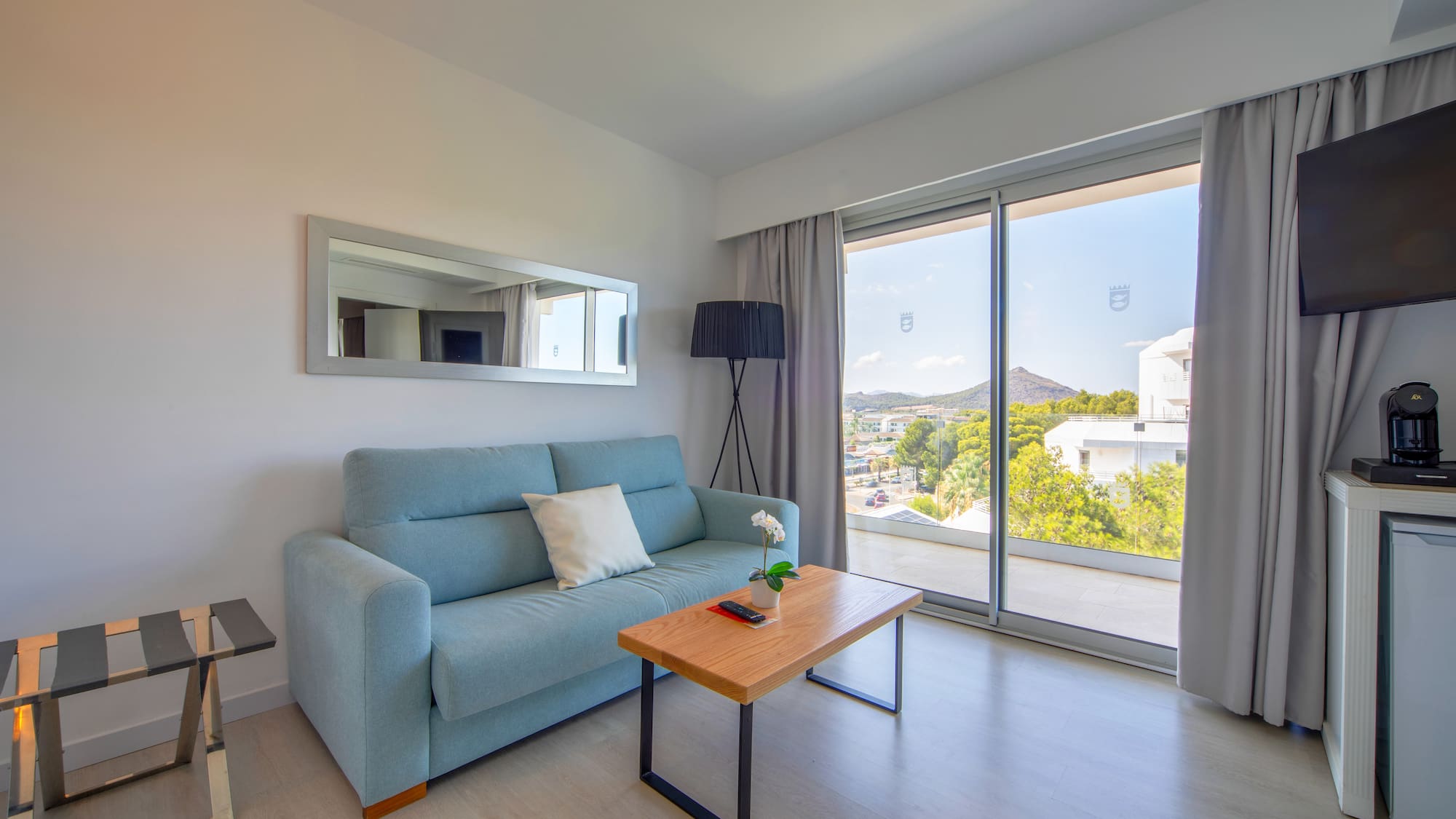 a living room with a couch and a table