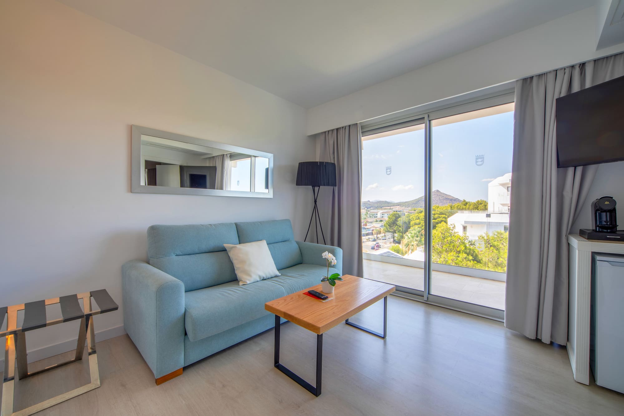 a living room with a couch and a table