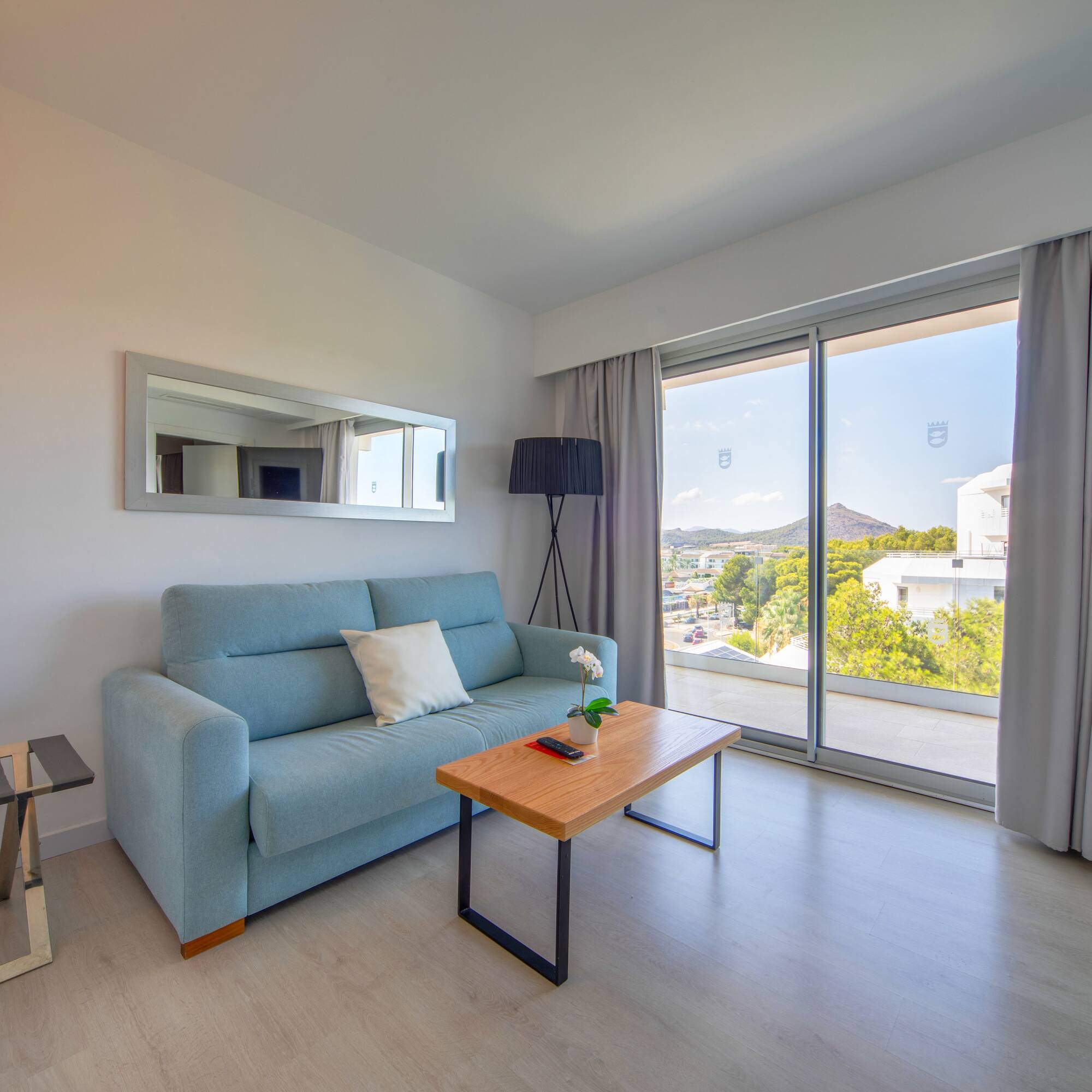 a living room with a couch and a table