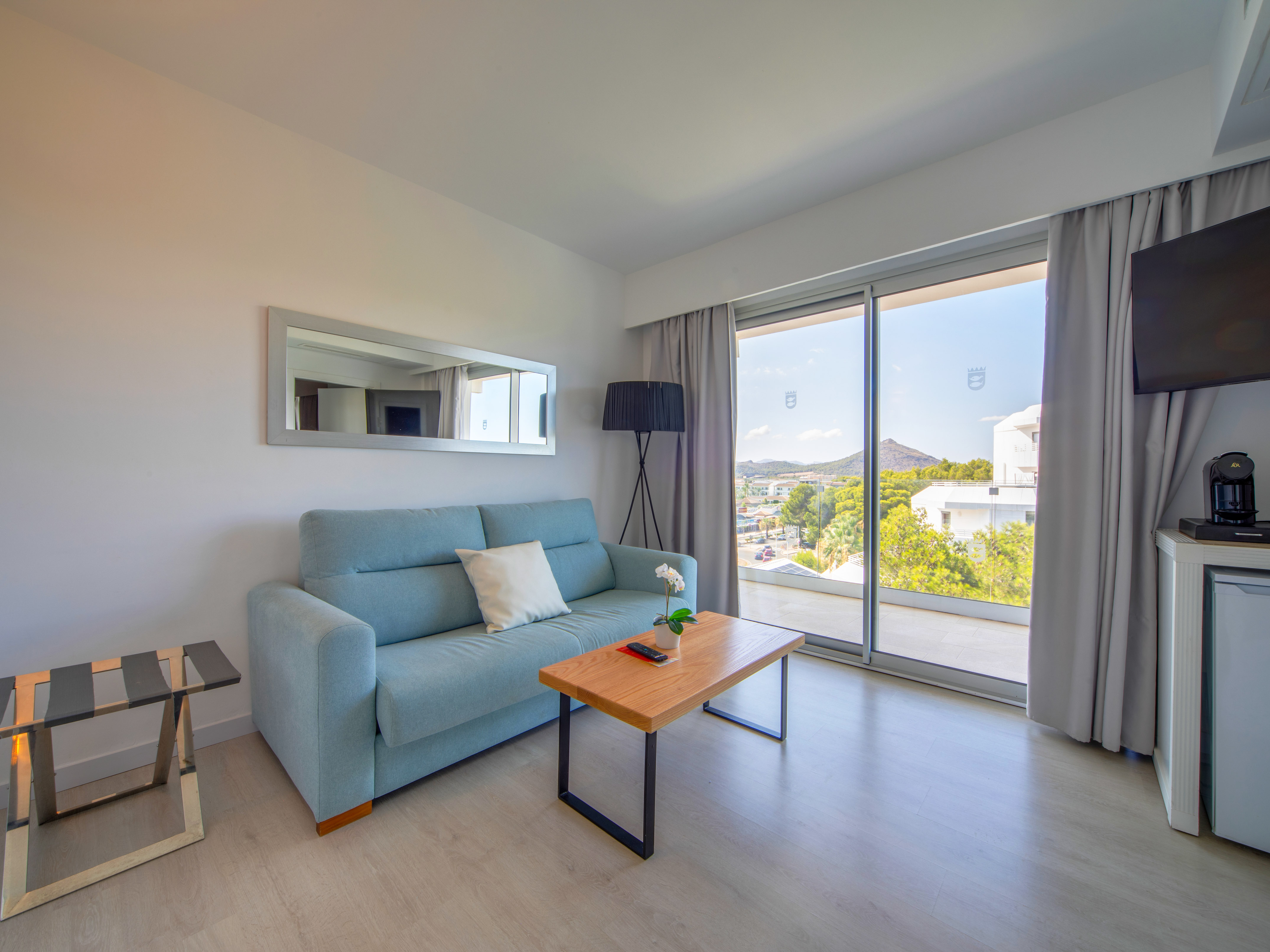 a living room with a couch and a table