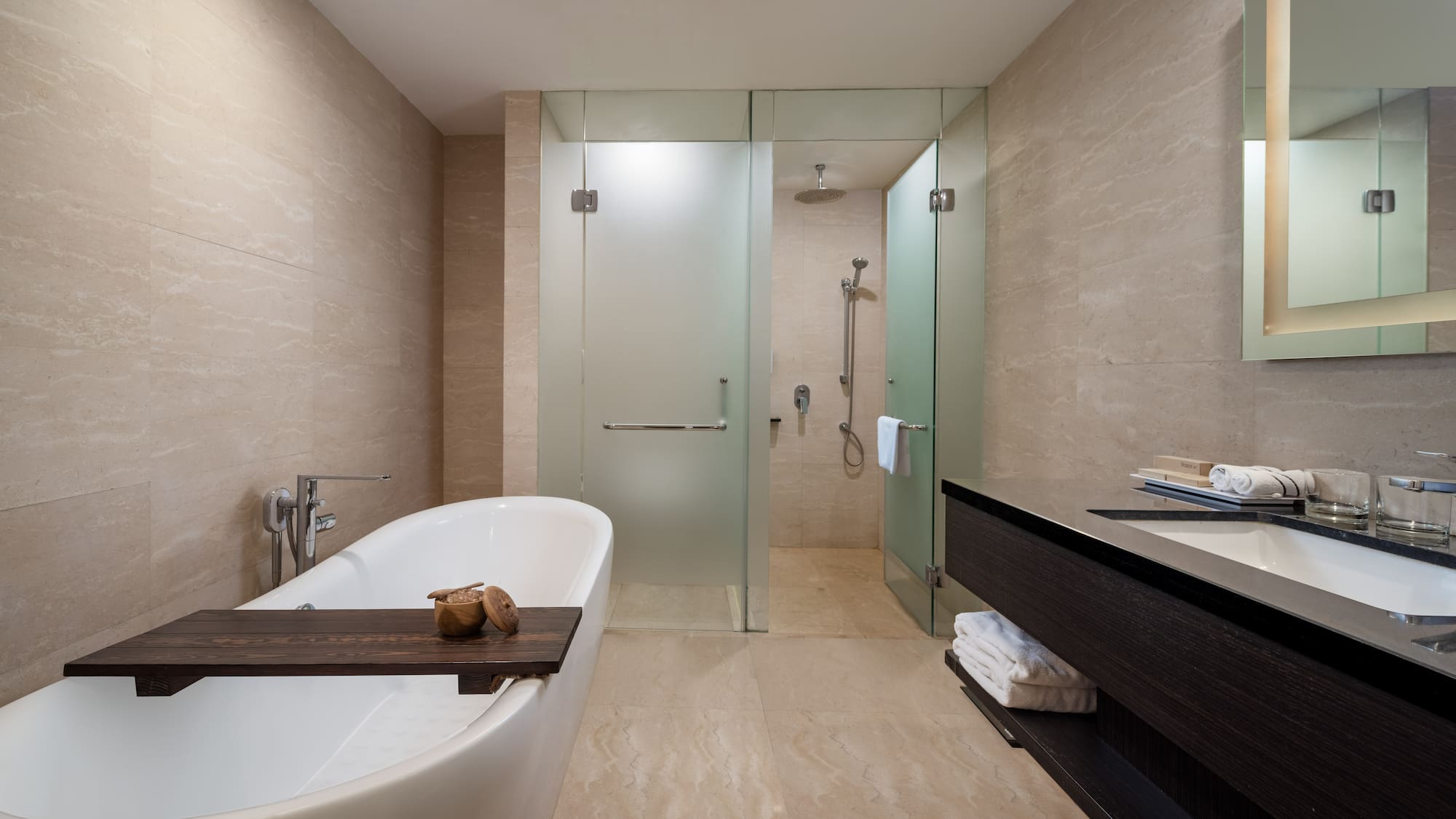 a bathroom with a bathtub and shower