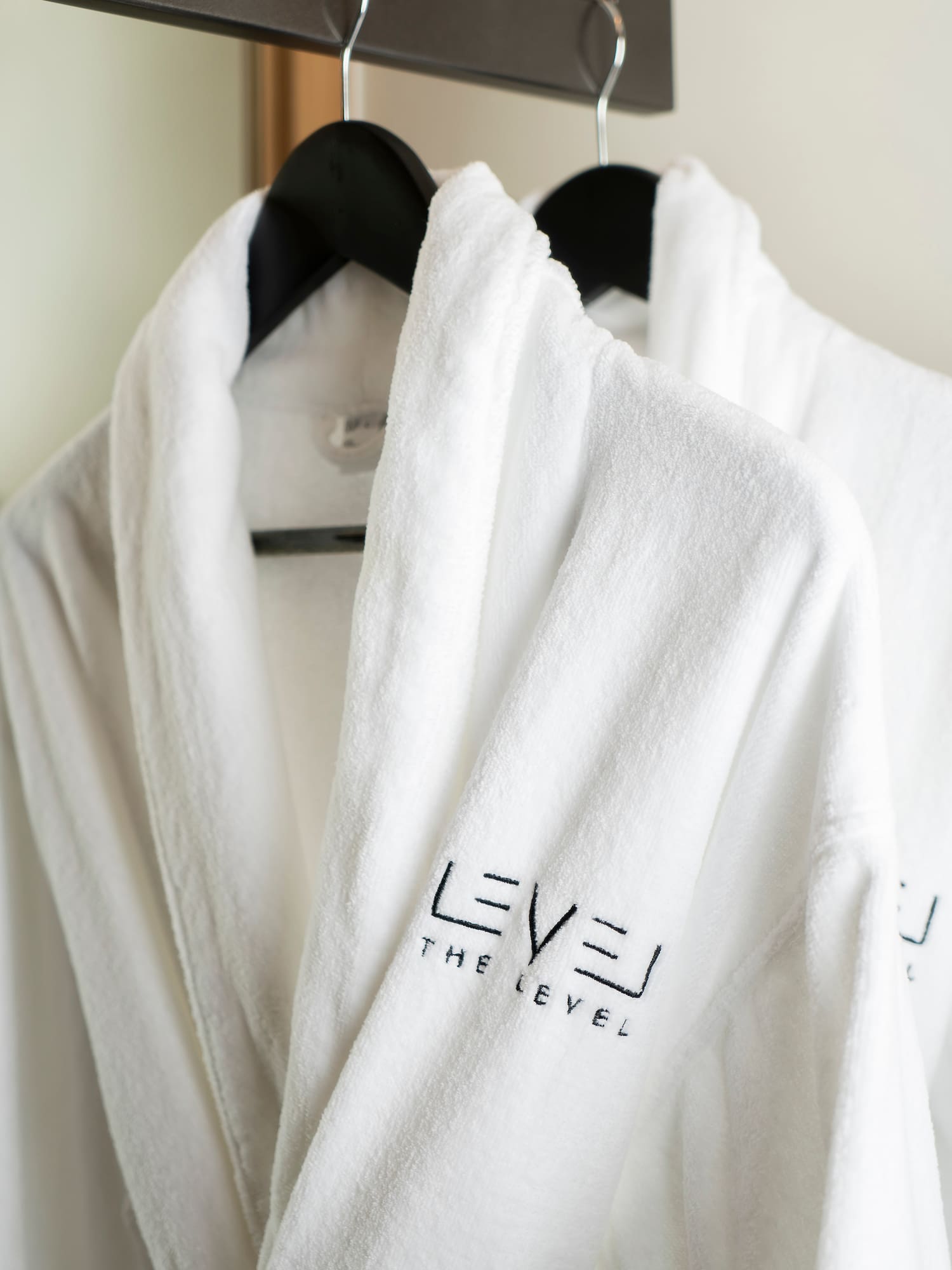a white bathrobe on a swinger