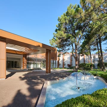 a water fountain in front of a building