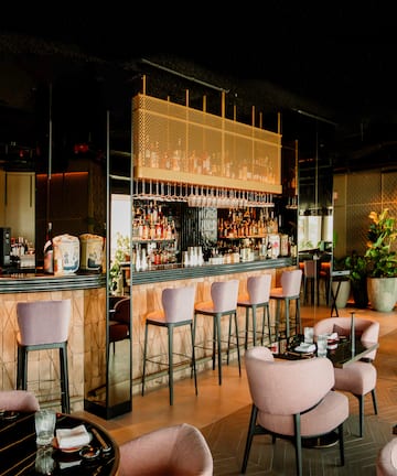 a restaurant with tables and chairs