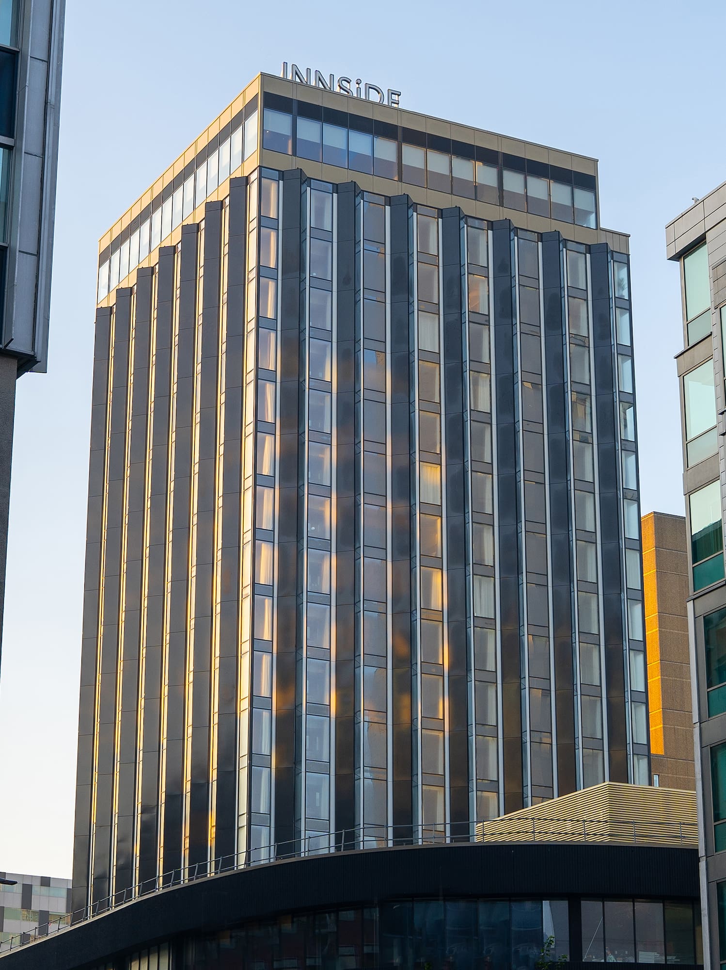 a group of buildings with glass walls