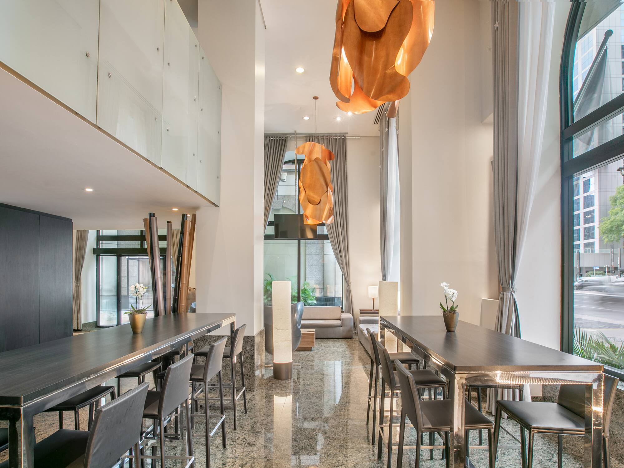 a room with tables and chairs