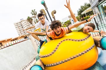 a group of kids posing for a picture