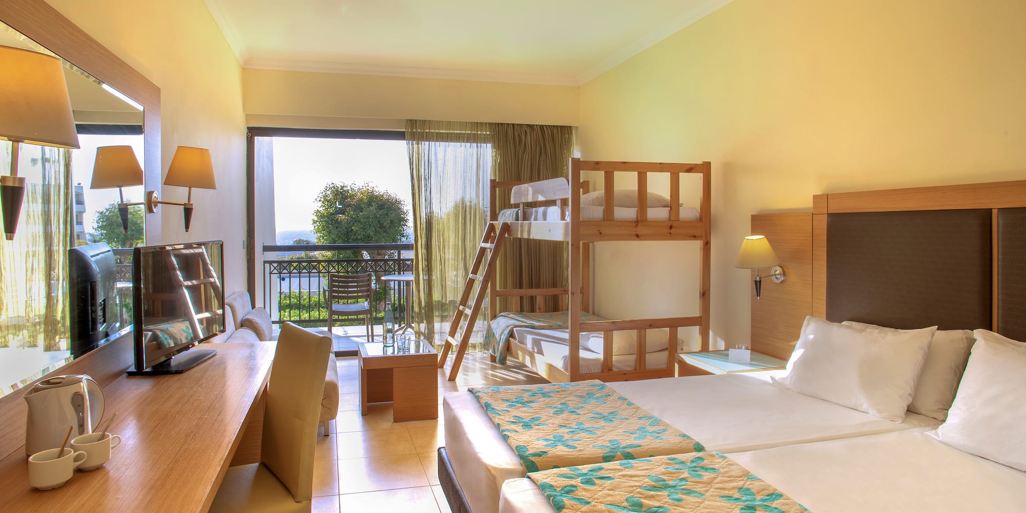 a room with bunk beds and a television