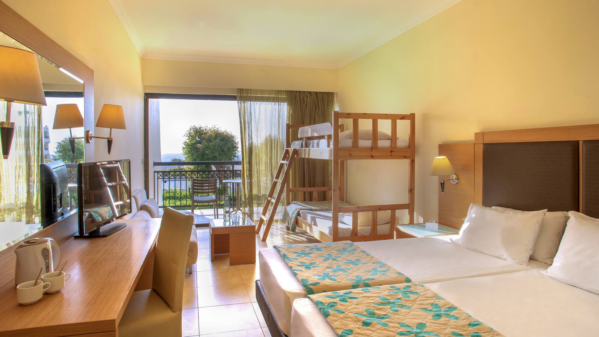 a room with bunk beds and a television