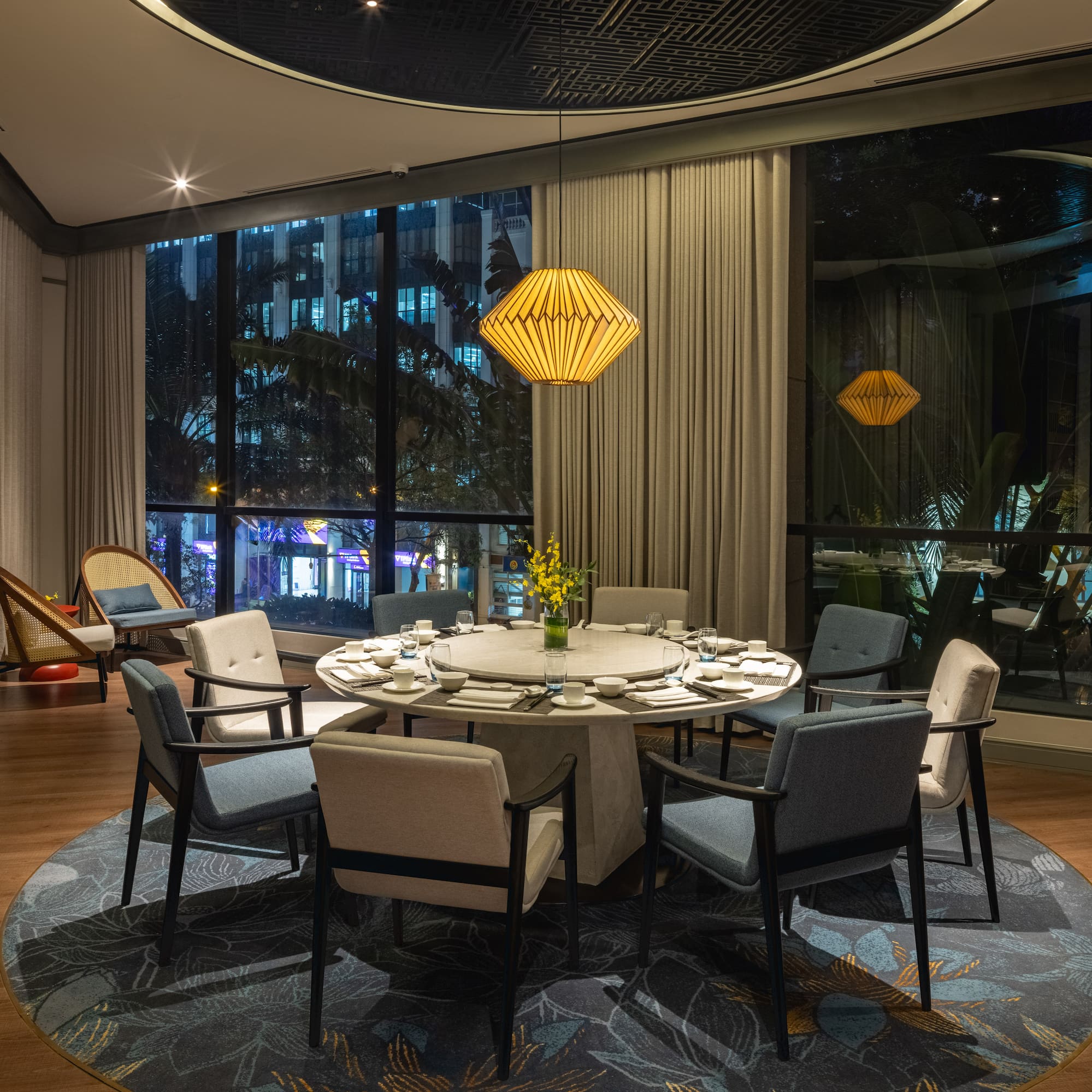 a dining room with a table and chairs