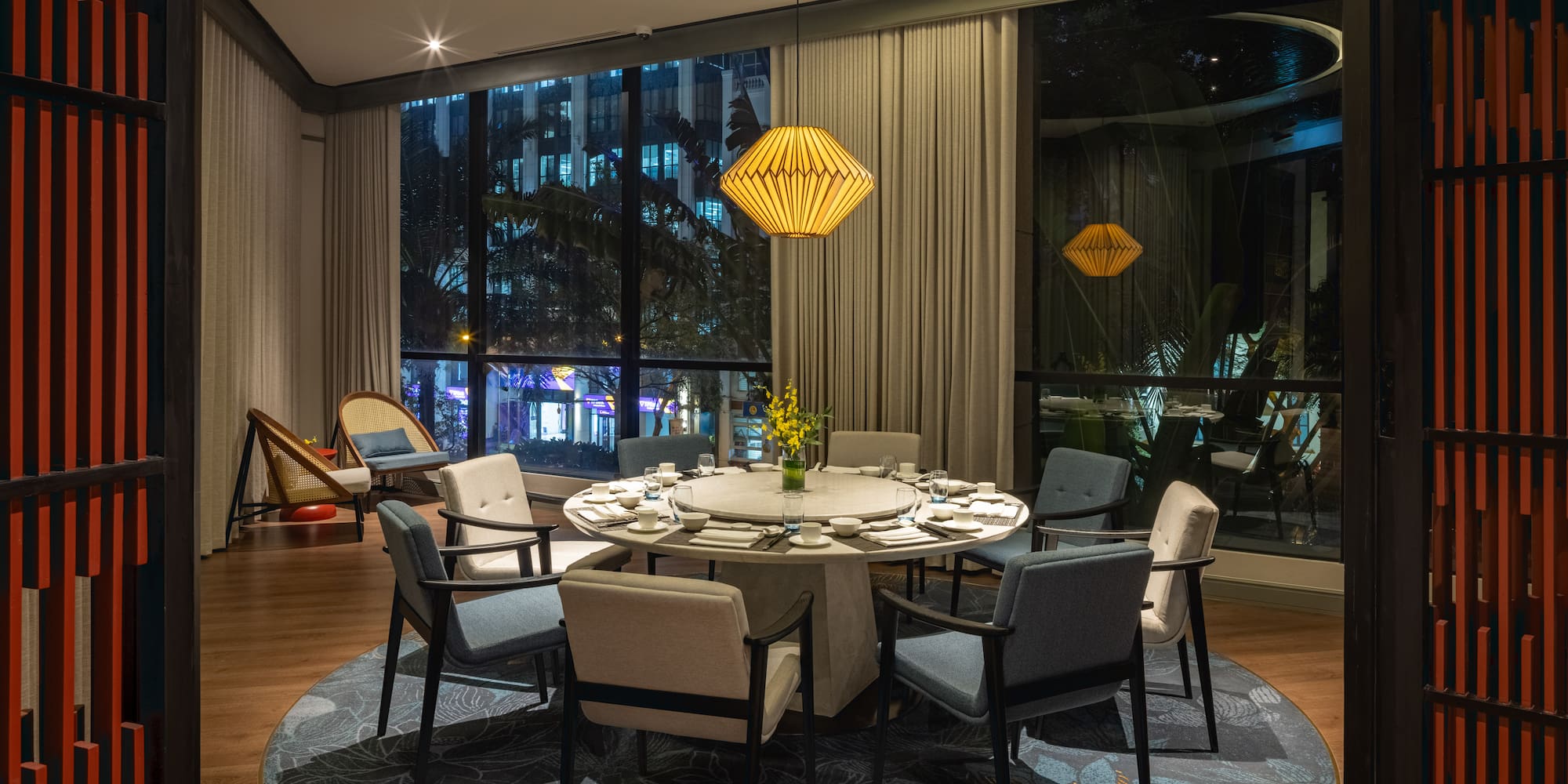 a dining room with a table and chairs