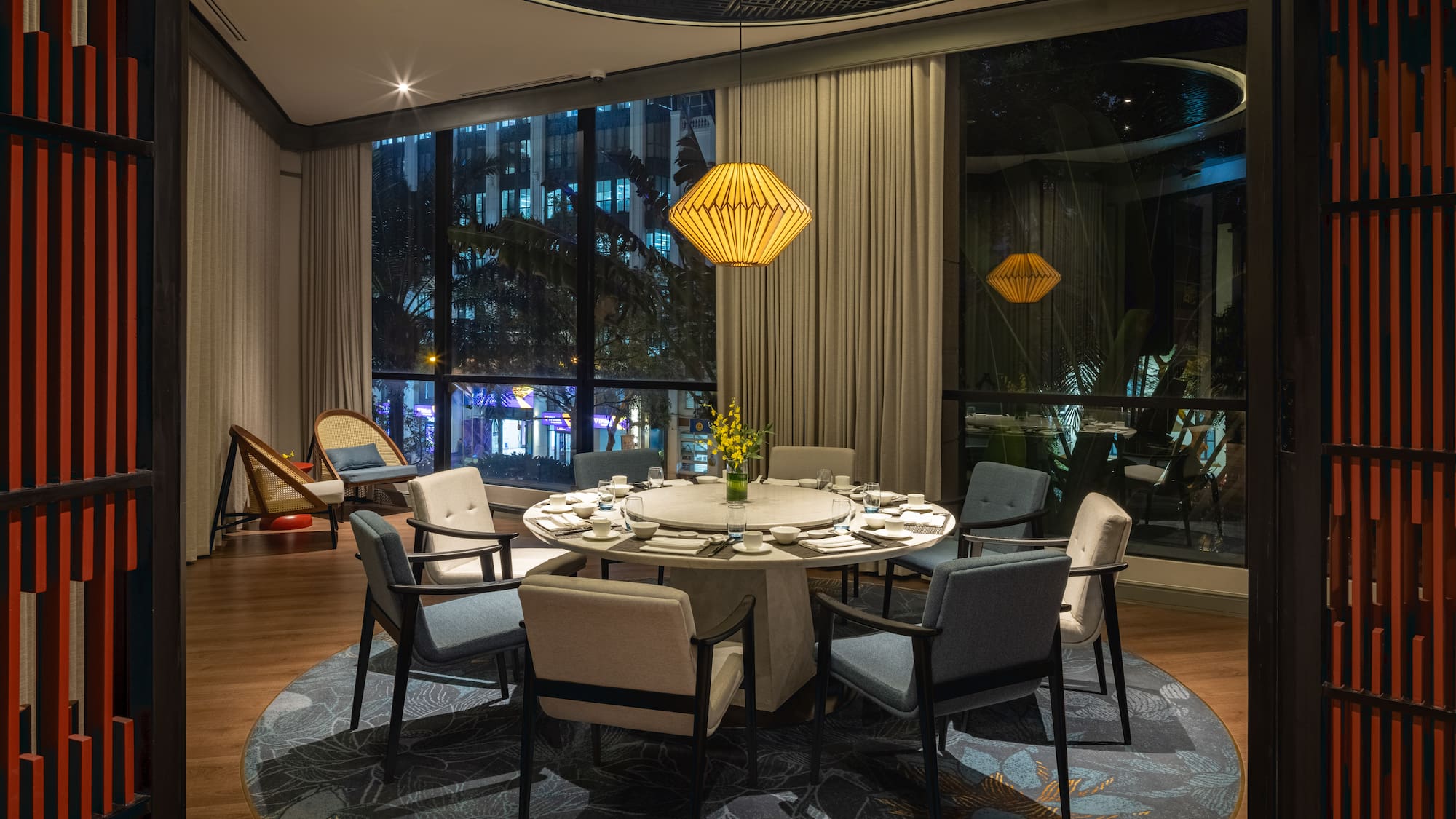 a dining room with a table and chairs