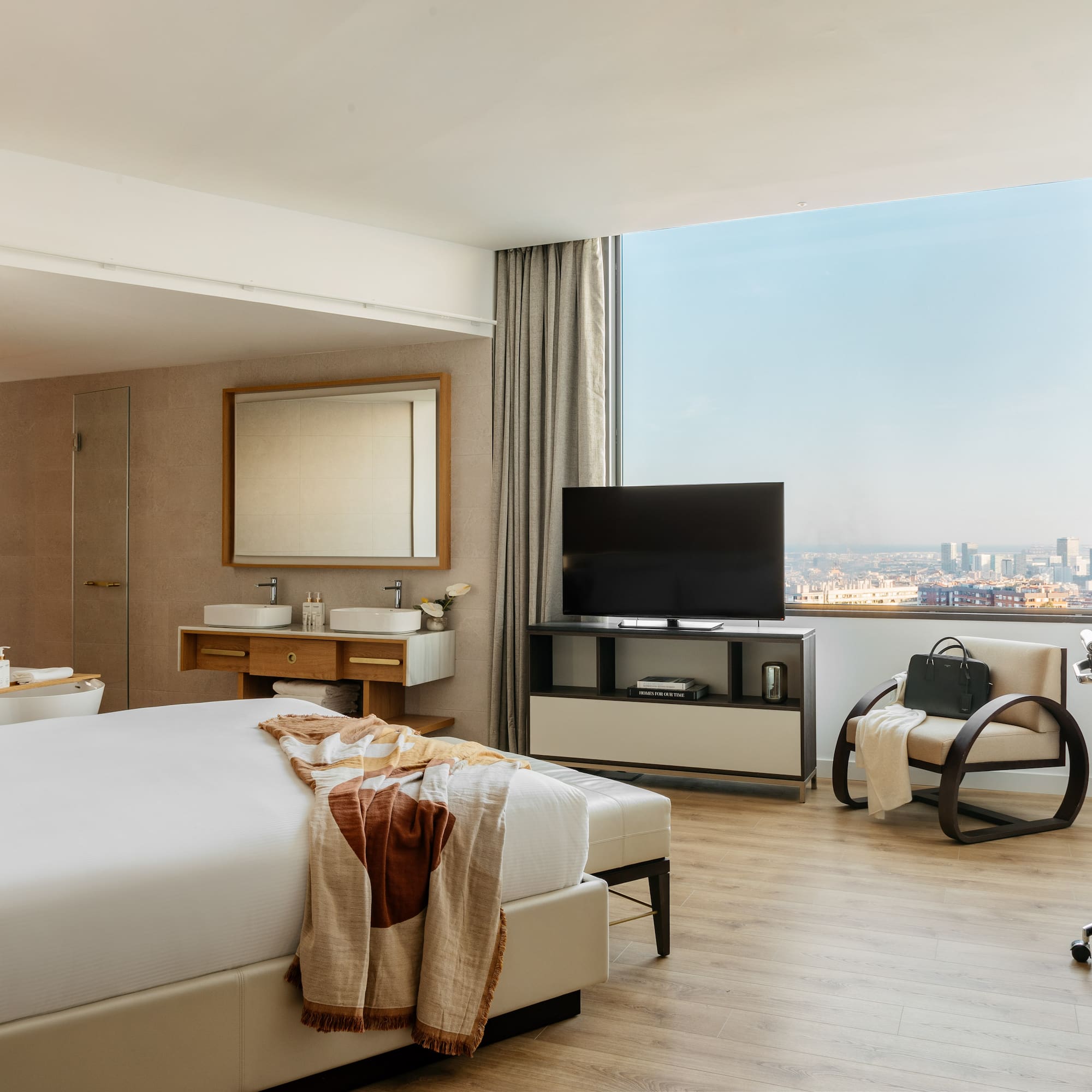 a bedroom with a toilet and a bed