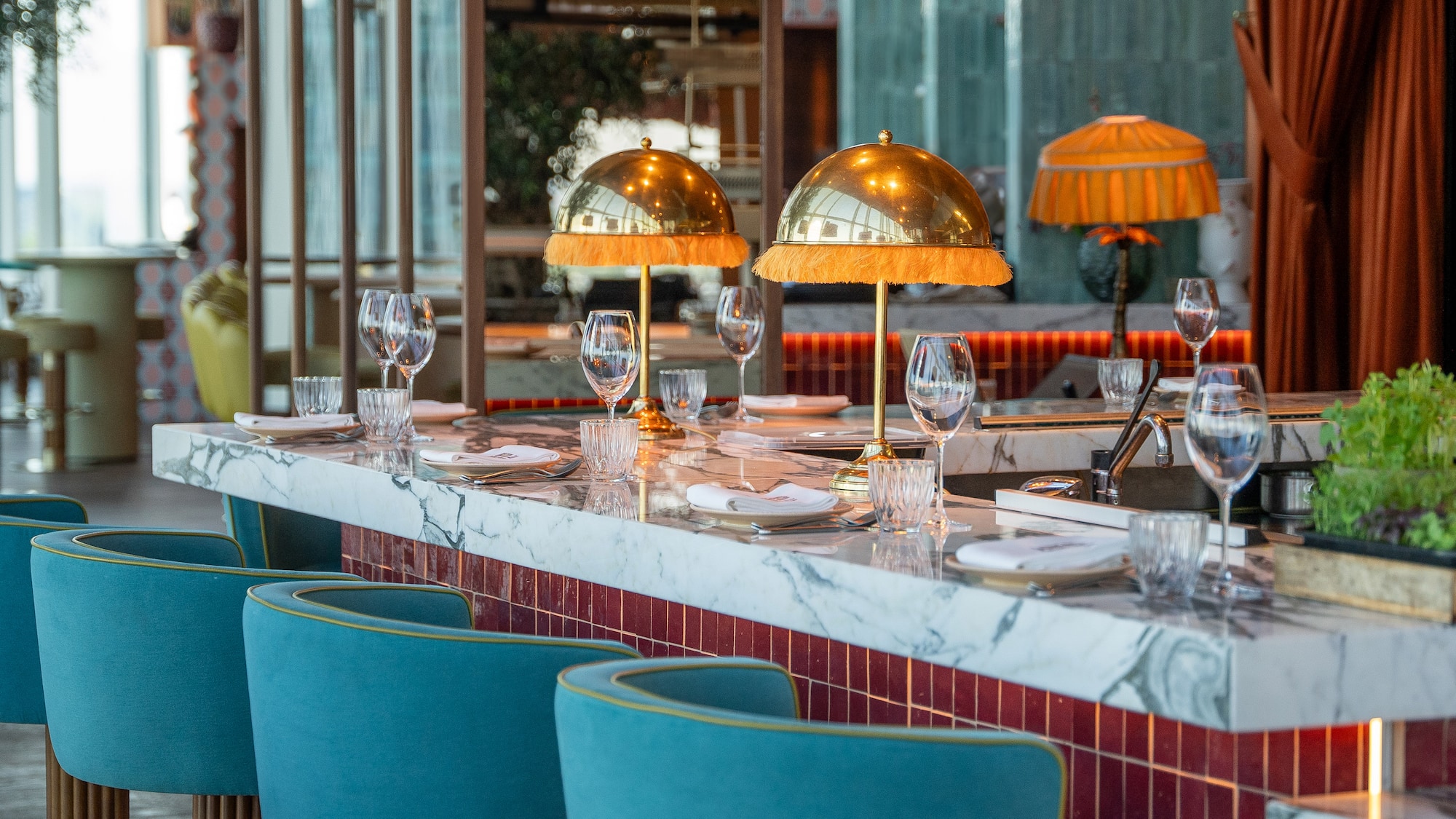 a table with glasses and plates on it